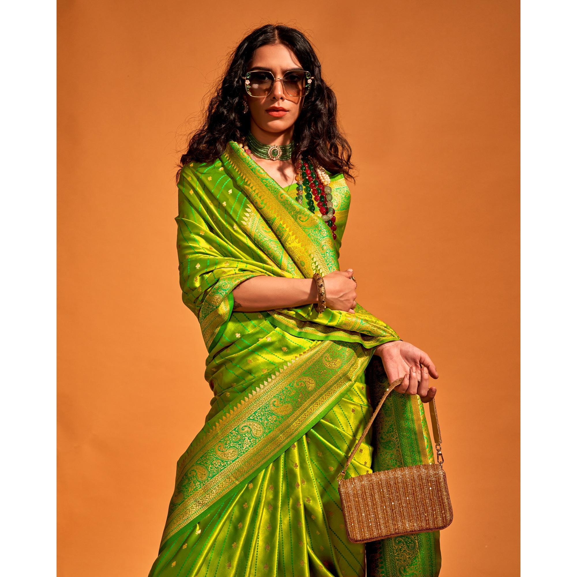 Green Woven Zari Border Satin Saree With Tassels