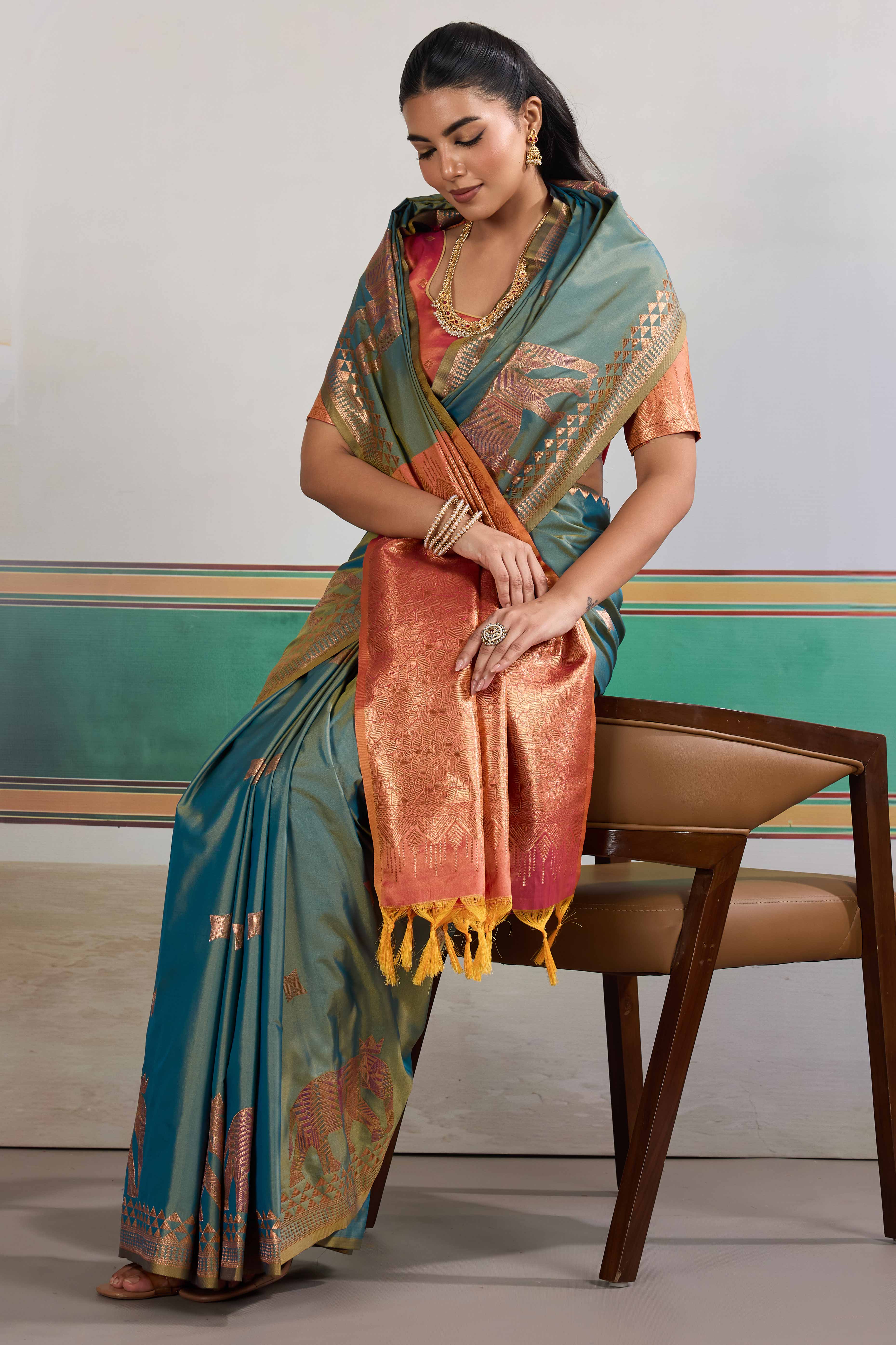 Traditional Teal Blue Pure Silk Saree Featuring Elephant Motif Zari Weaving & Tassel Pallu