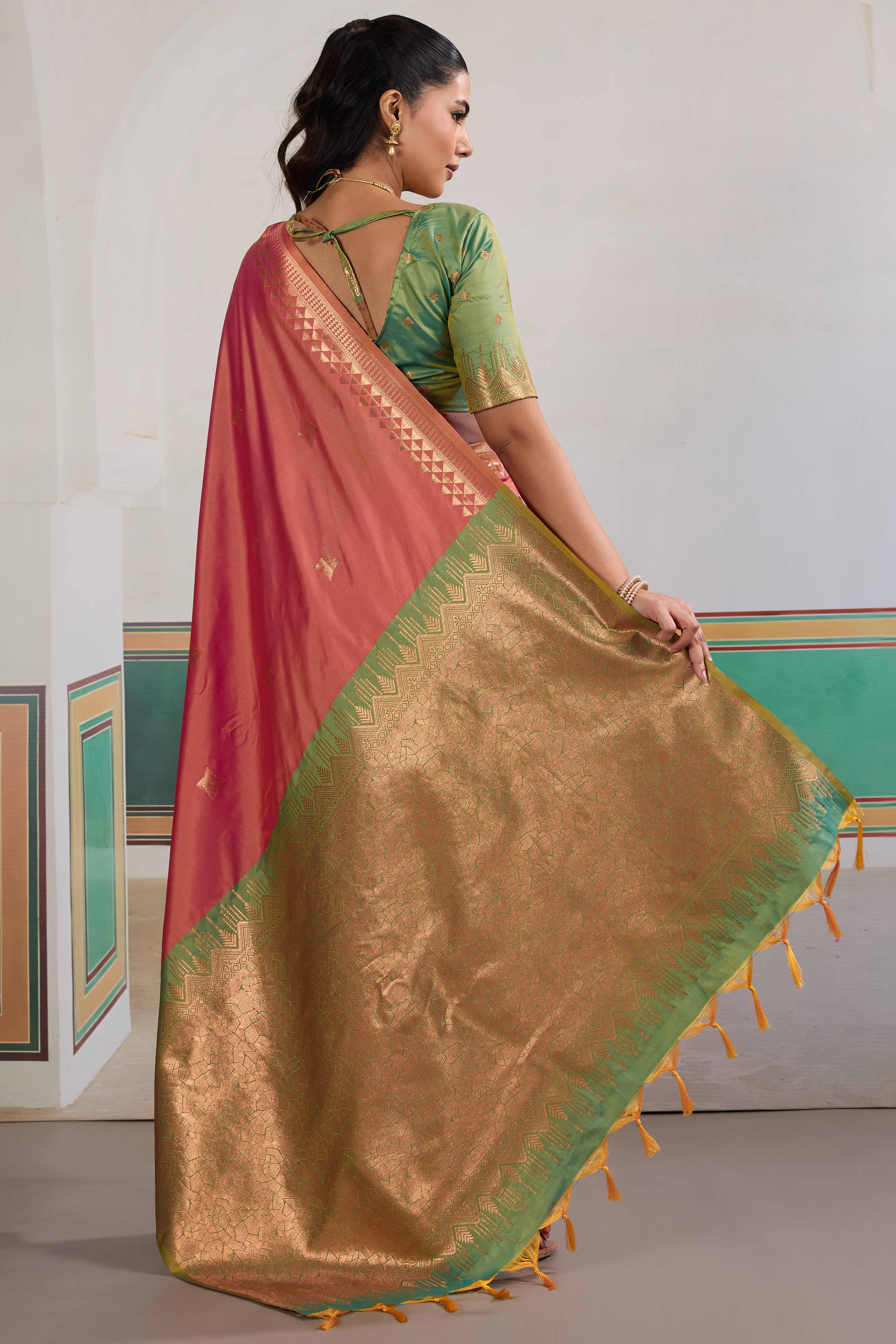 Traditional Rose Pink Pure Silk Saree Featuring Elephant Motif Zari Weaving & Tassel Pallu