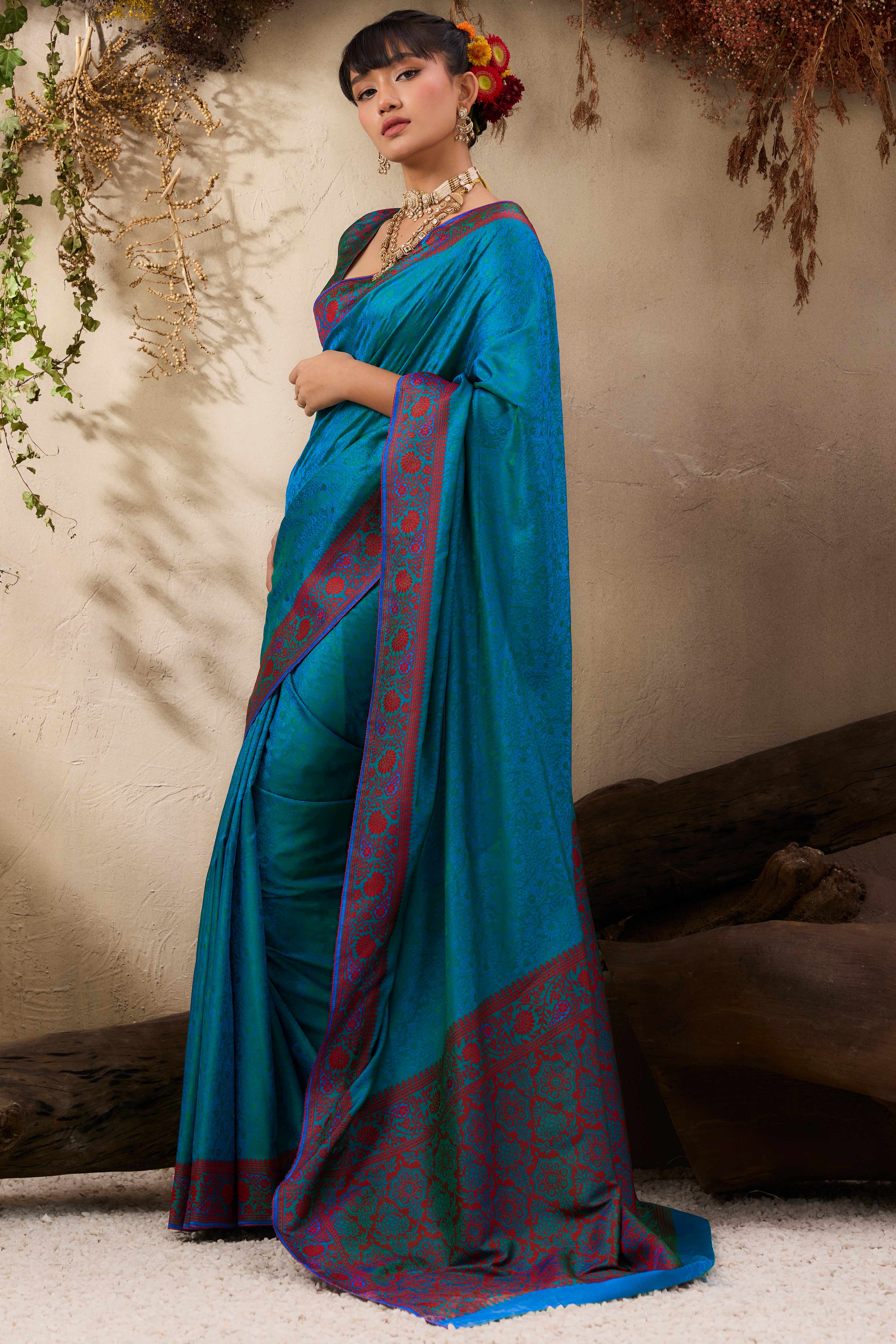 Teal Pure Silk Kanjivaram Handloom Saree Enhanced with Zari Woven Patterns