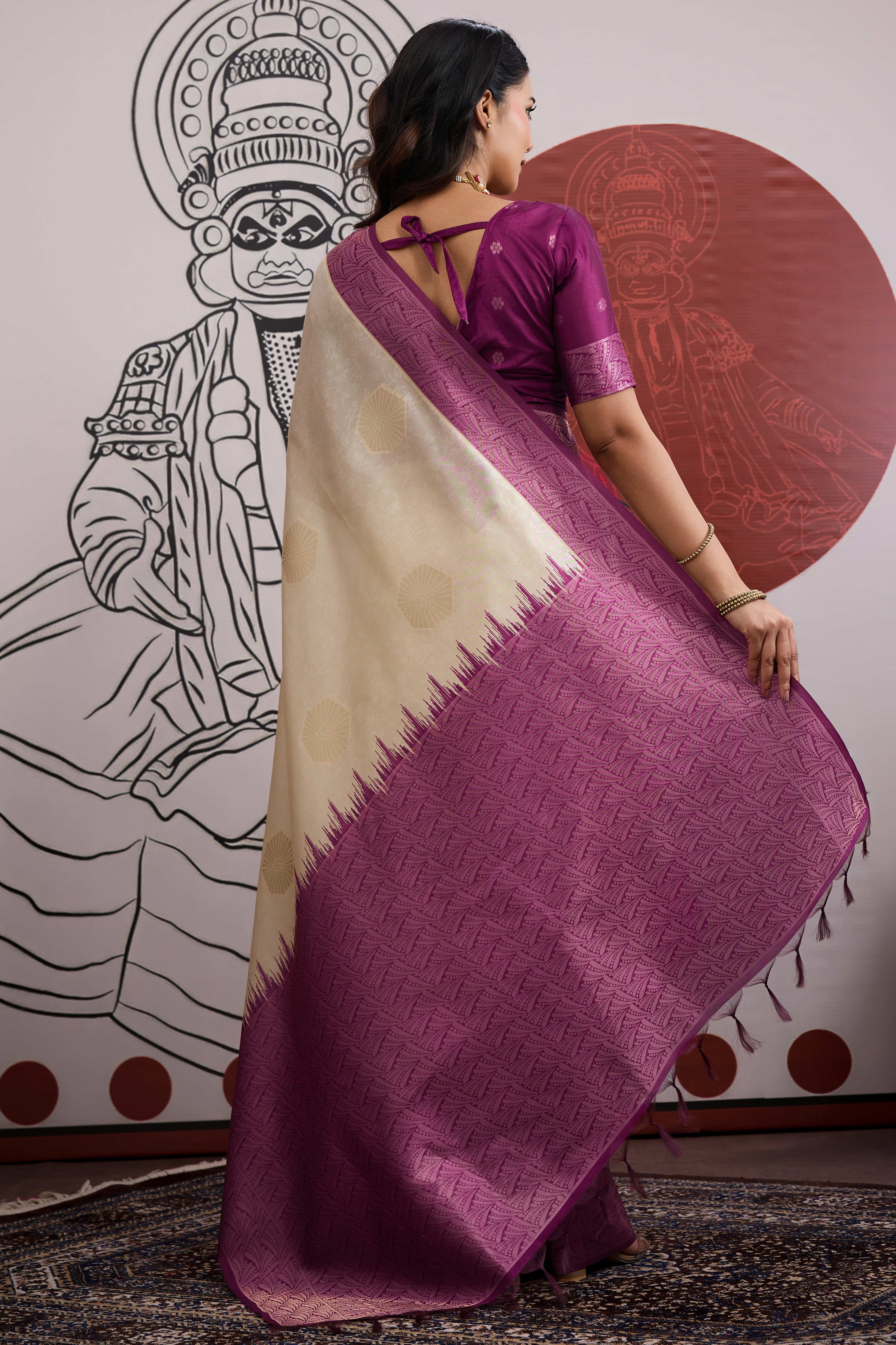 Graceful Cream & Purple Zari Weaving Silk Saree Highlighted By Decorative Tassel Pallu