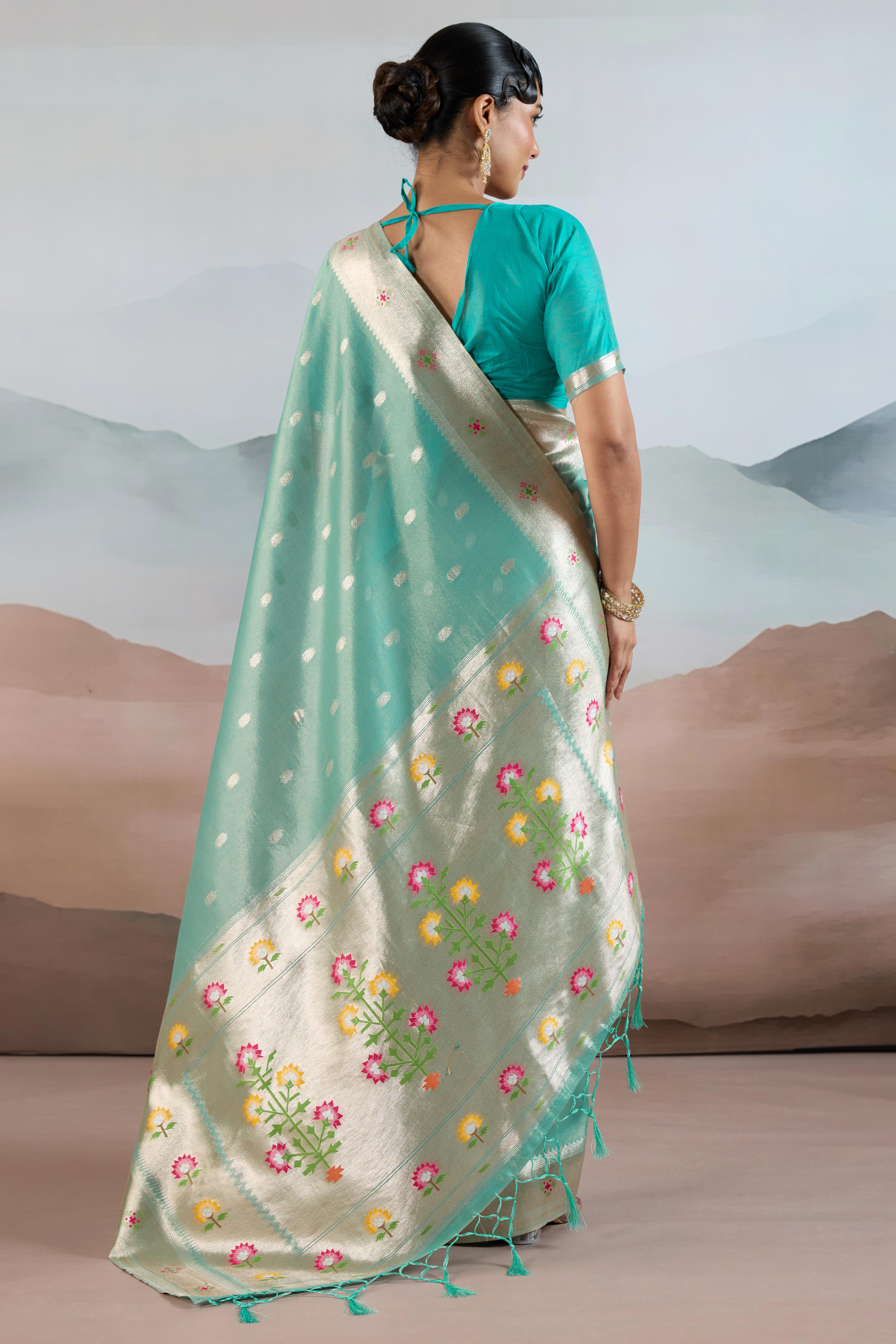 Turquoise Festive Tissue Saree Crafted with Artistic Zari Butti Weaving and a Featherlight Texture