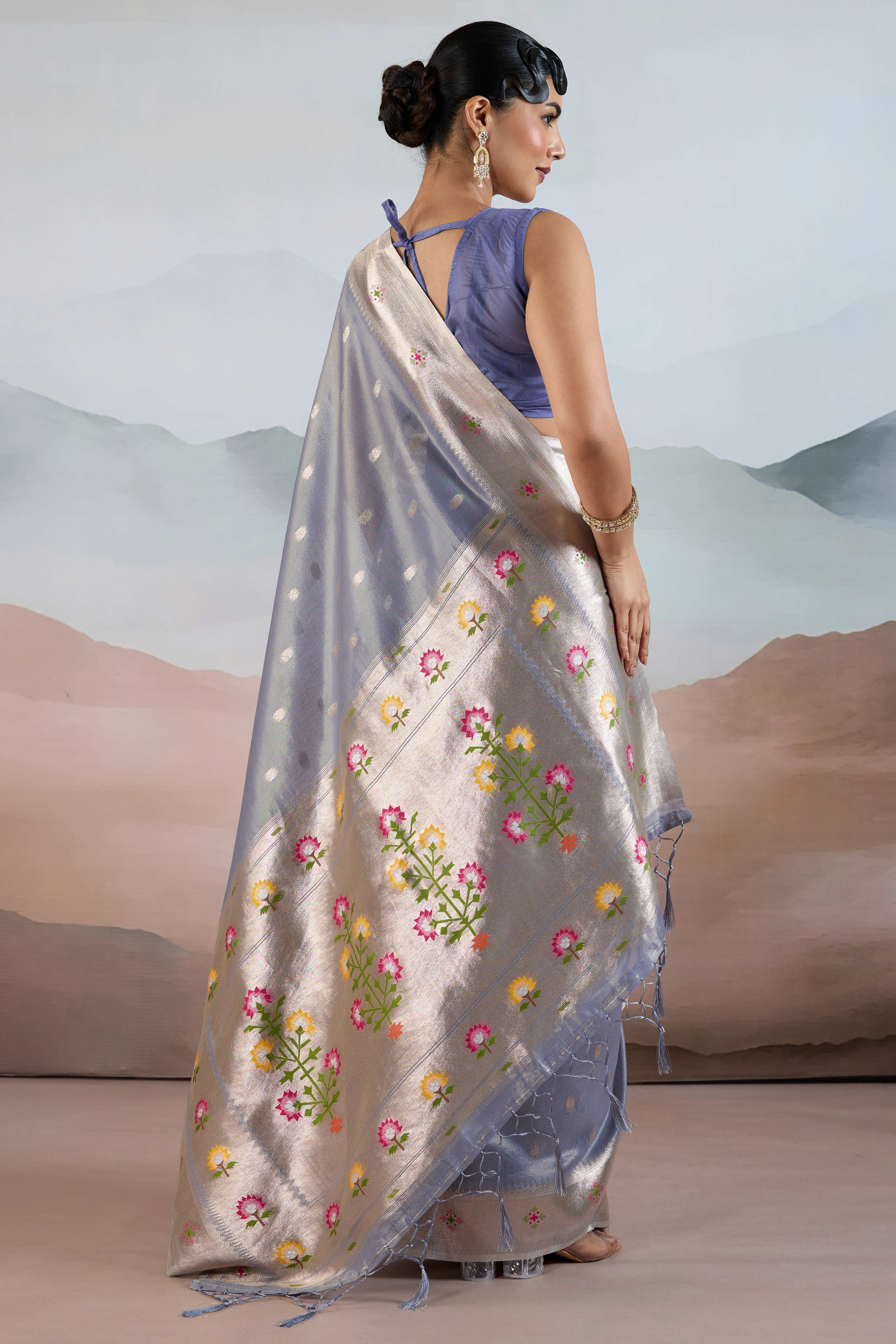 Blue Festive Tissue Saree Crafted with Artistic Zari Butti Weaving and a Featherlight Texture