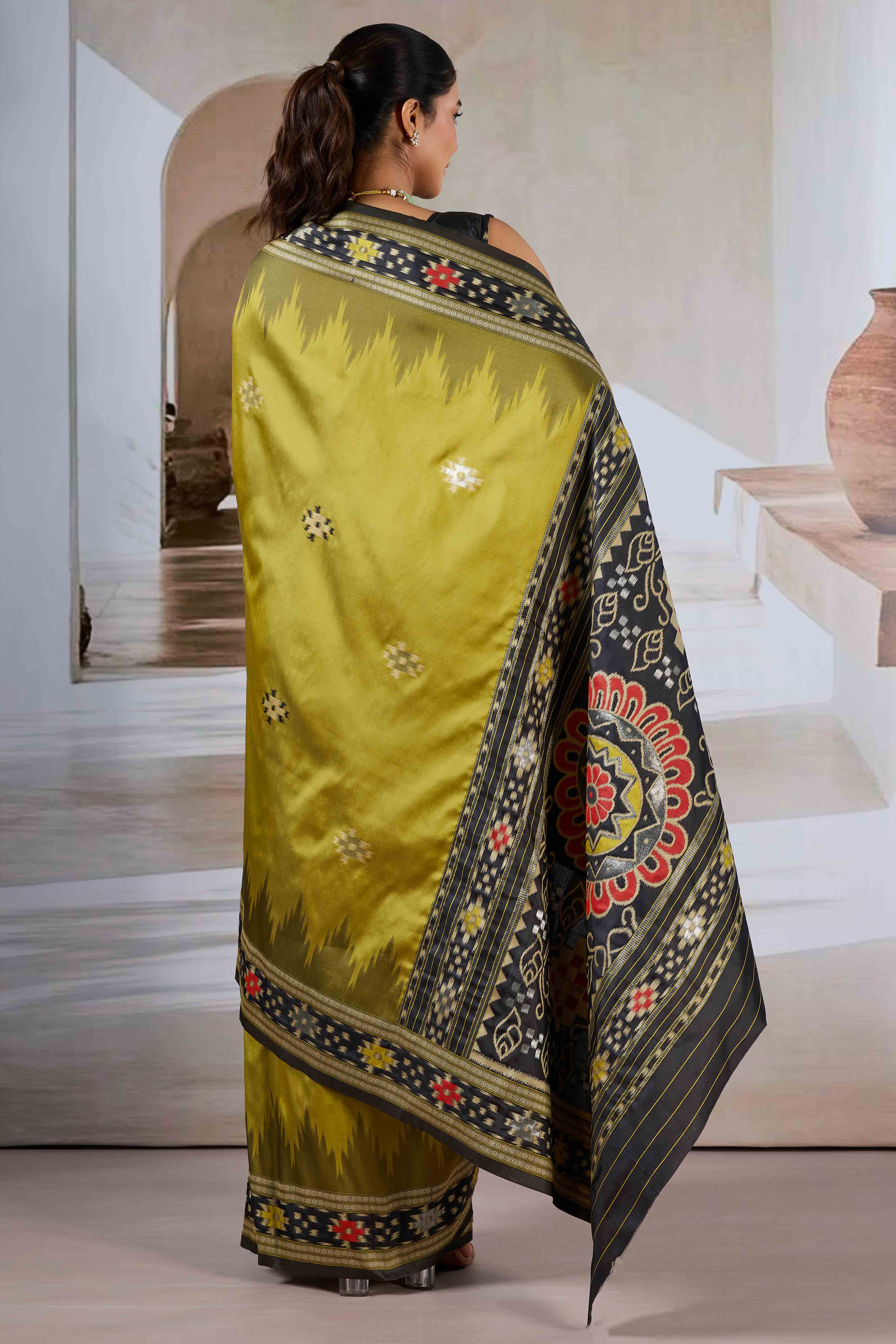 Olive Art Silk Saree Adorned with Intricate Patola Style Woven Designs