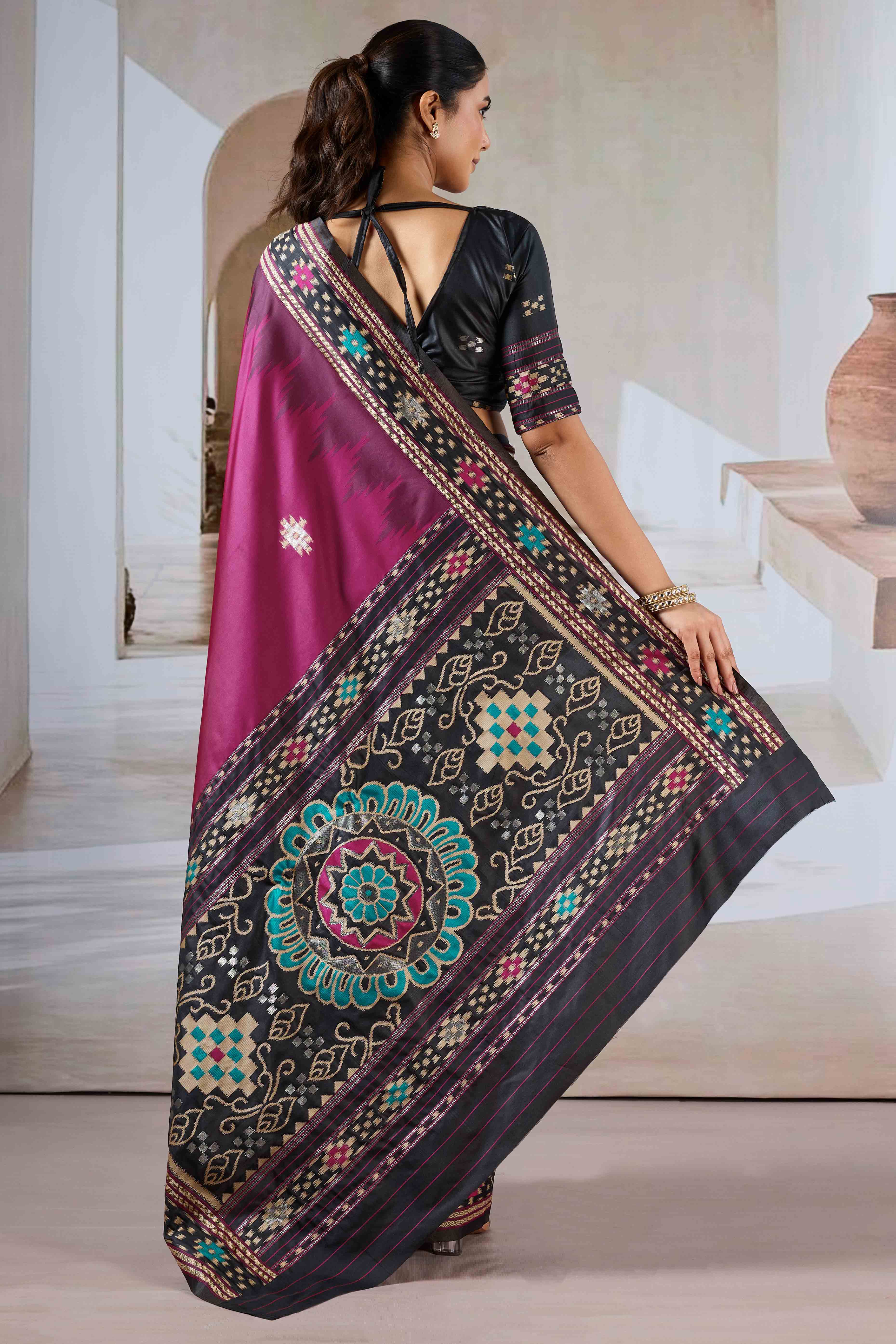 Magenta Art Silk Saree Adorned with Intricate Patola Style Woven Designs