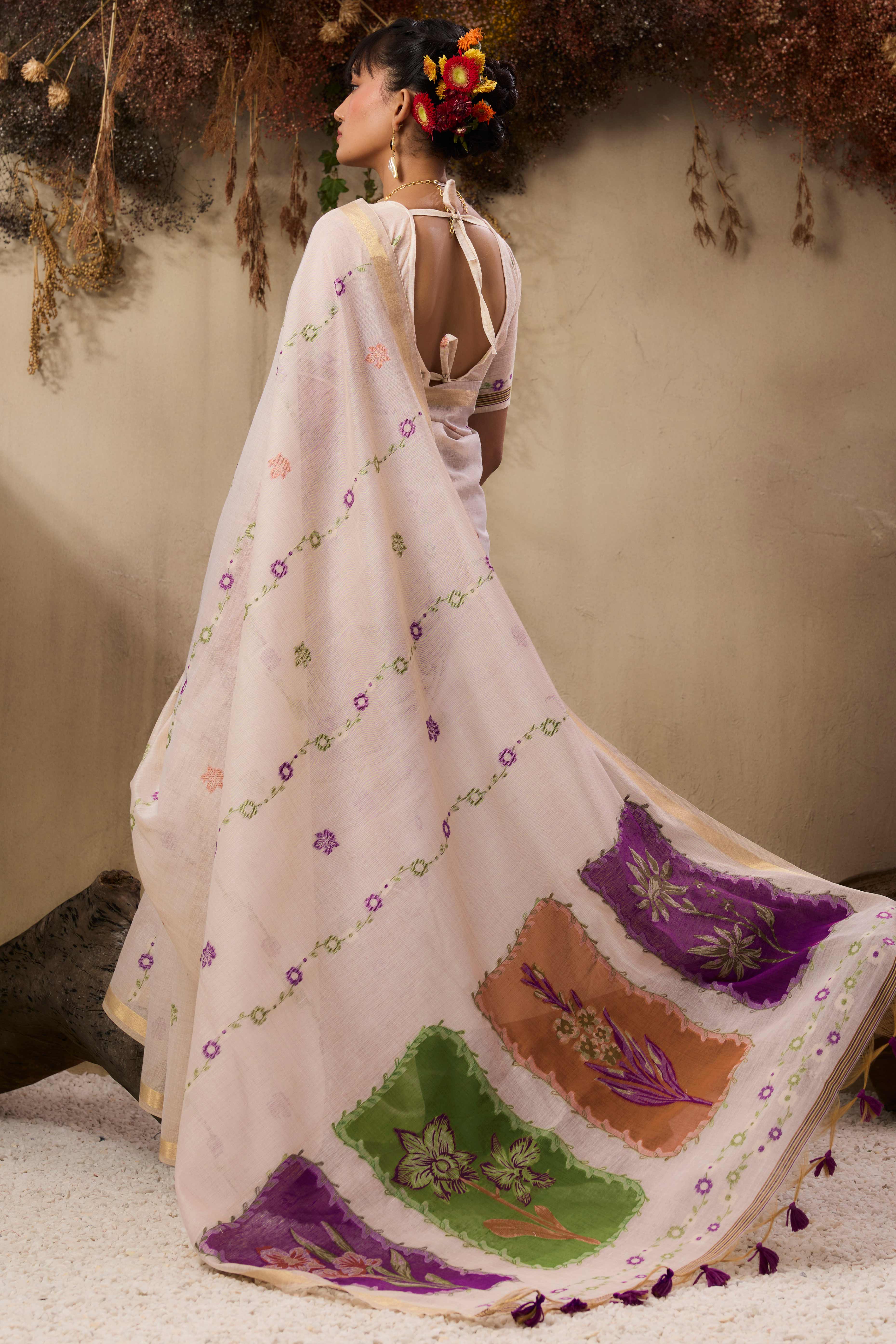 Cream Pure Munga Cotton Blend Saree Adorned with Intricate Floral Weaves