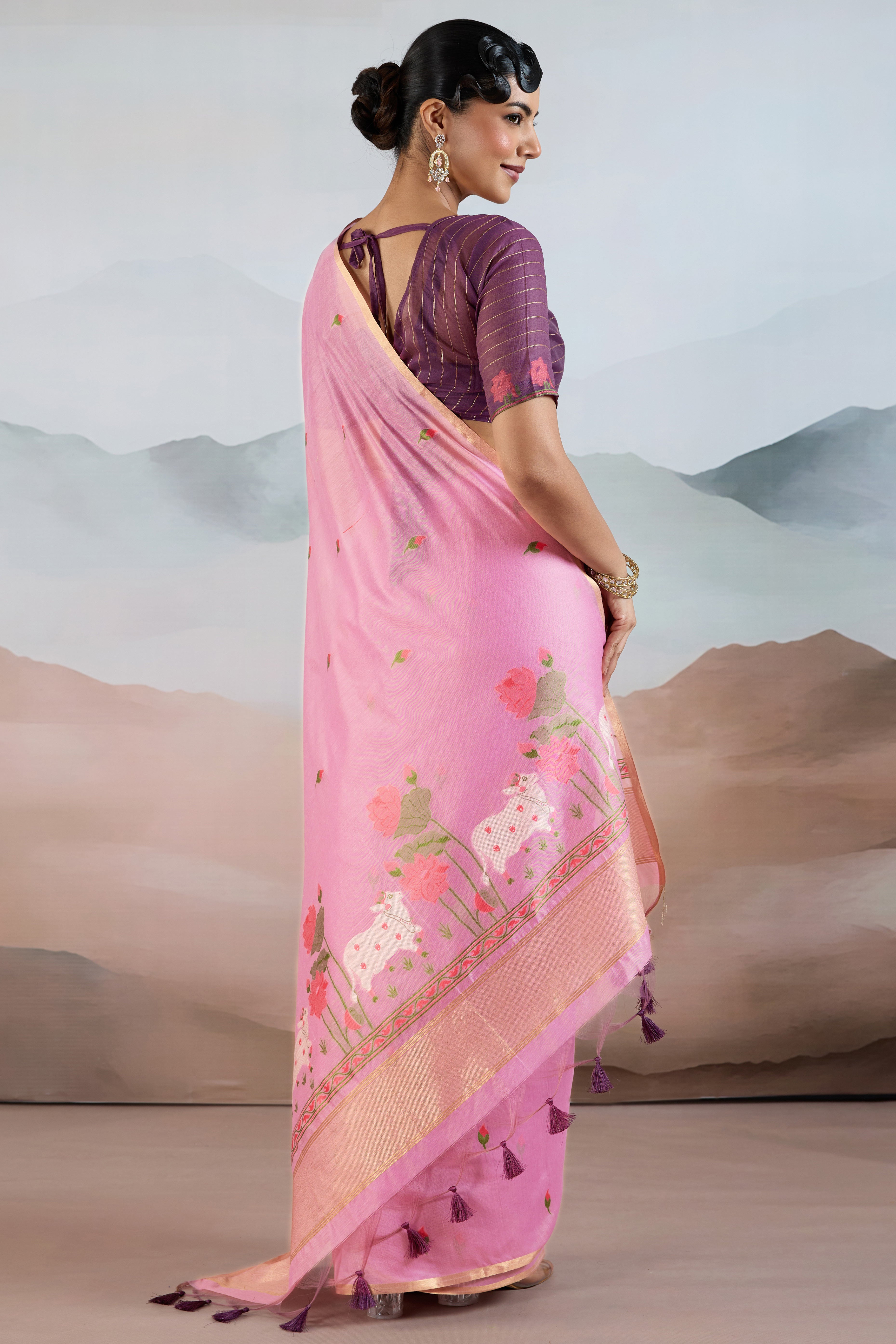 Trendy Pink Cotton Blend Weaving Saree Showcasing Floral & Animal Motif & Classic Tassel Pallu