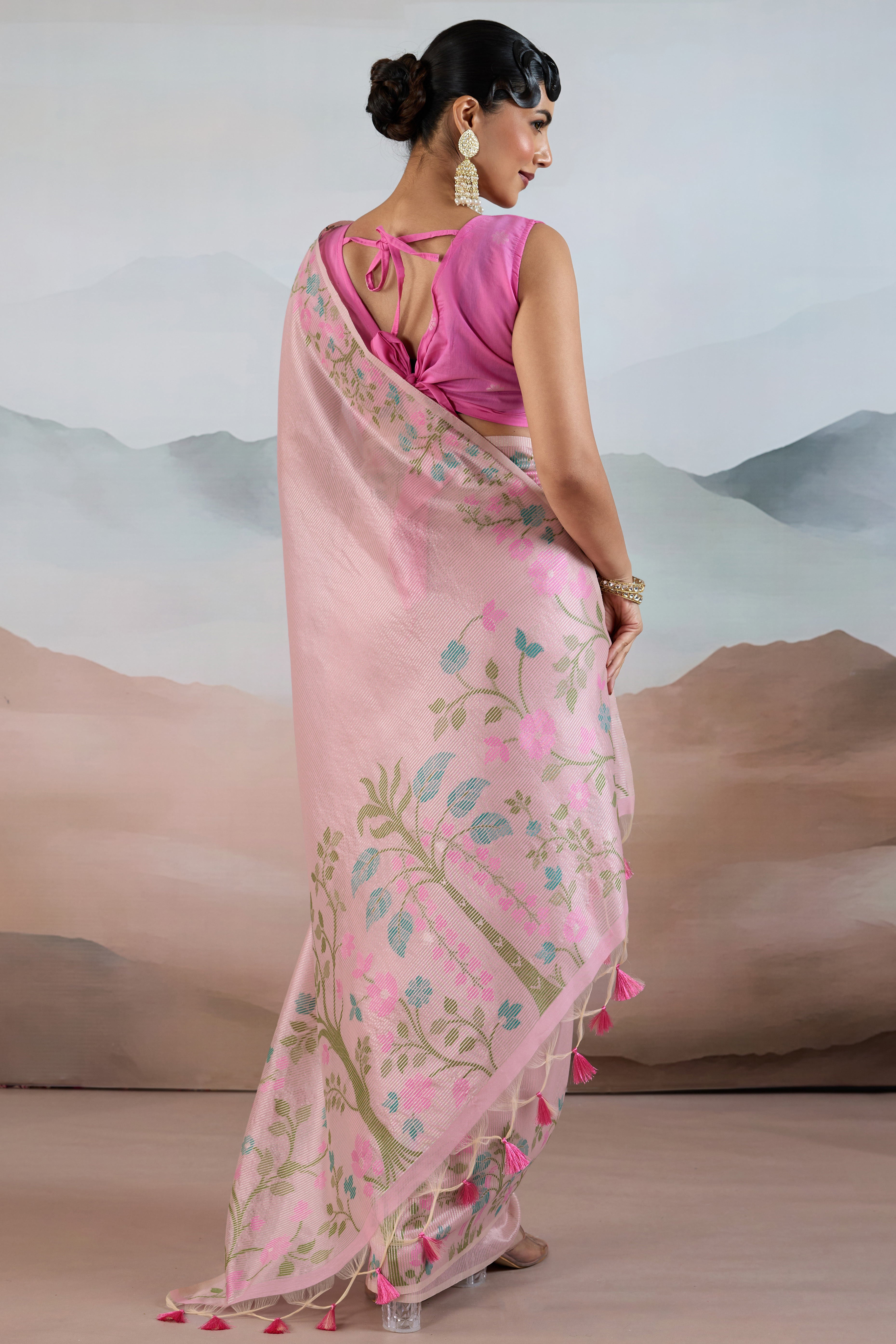 Pink Tissue Silk Saree Showcasing Floral & Striped Weaving With Tassel Adornment