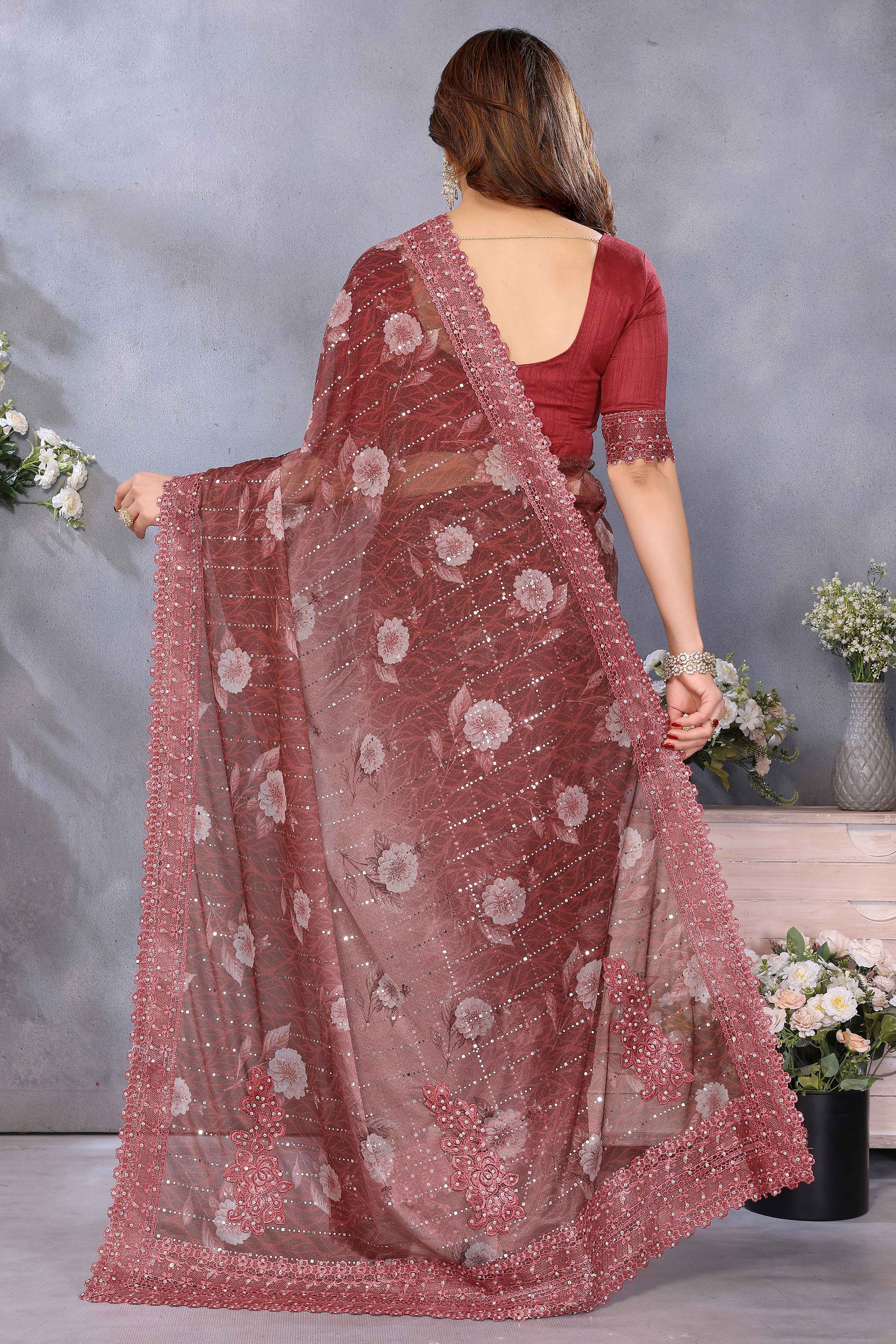 Rich Brown Lycra Saree Adorned with Floral Print and Decorative Patch Work for a Chic Party Look