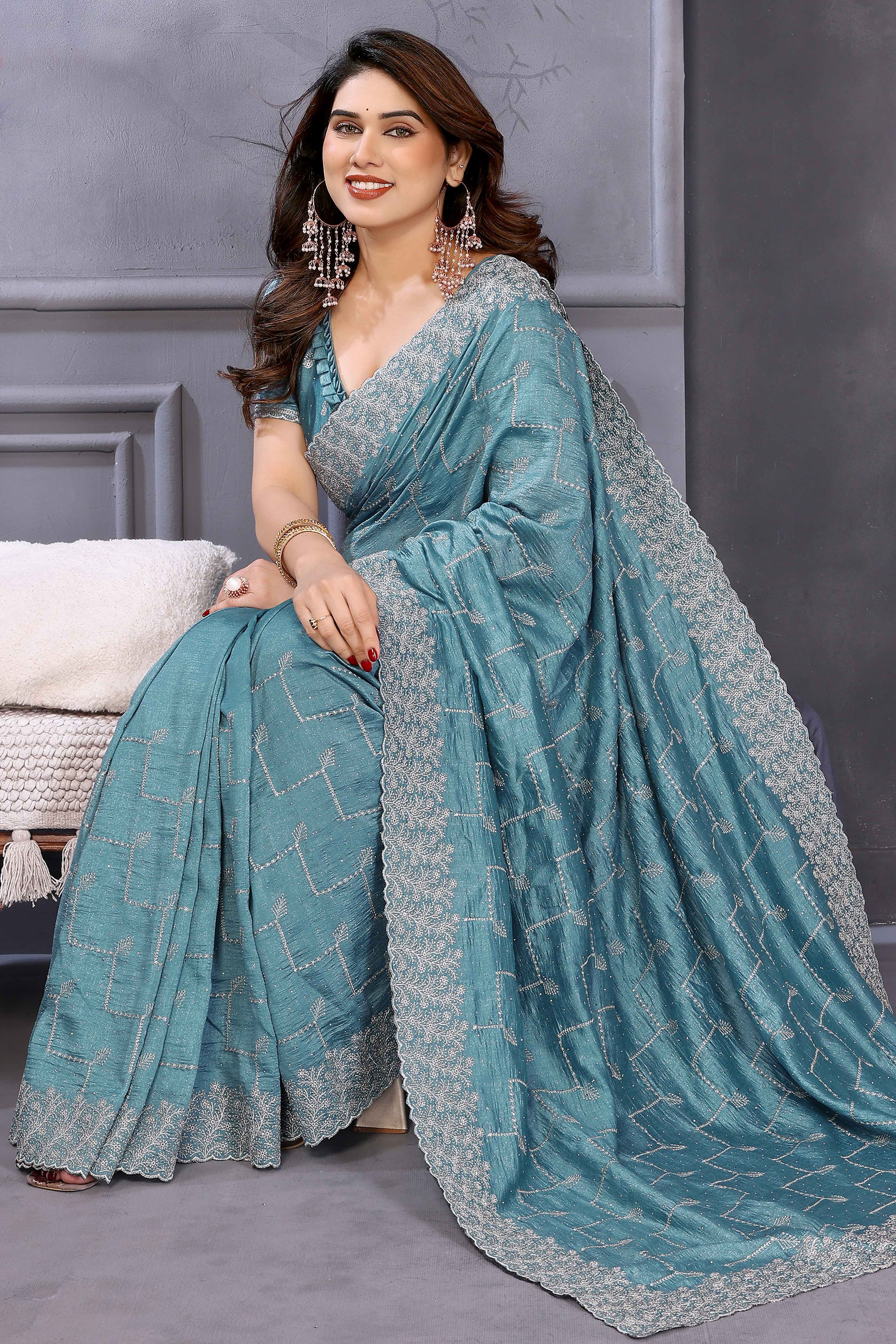 Refreshing Aqua Blue Vichitra Silk Saree with Traditional Zari Embroidery and Stone Embellishments