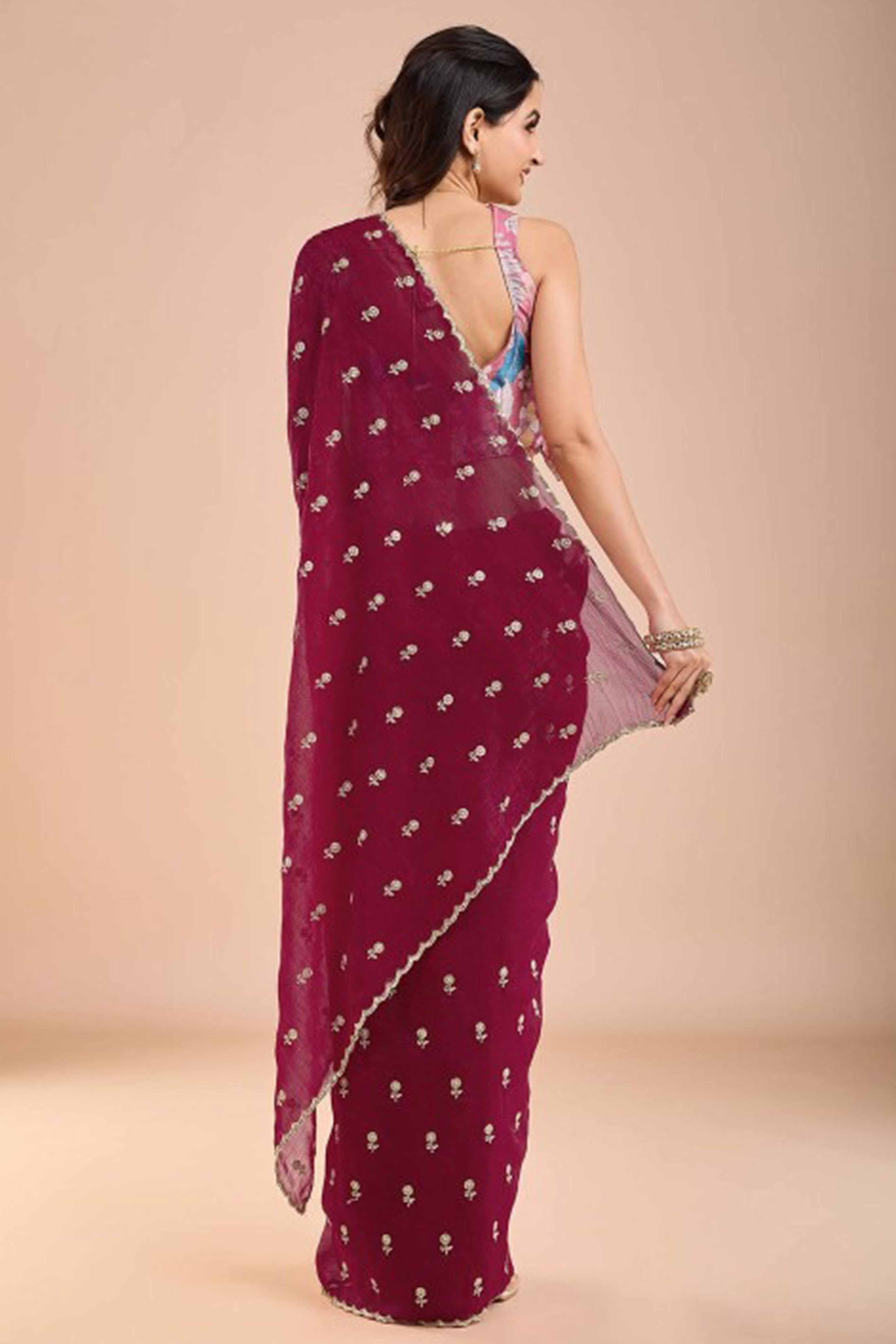 Rani Pink Crunchy Saree Adorned With Floral Sequins Embroidery & Graceful Border Finish