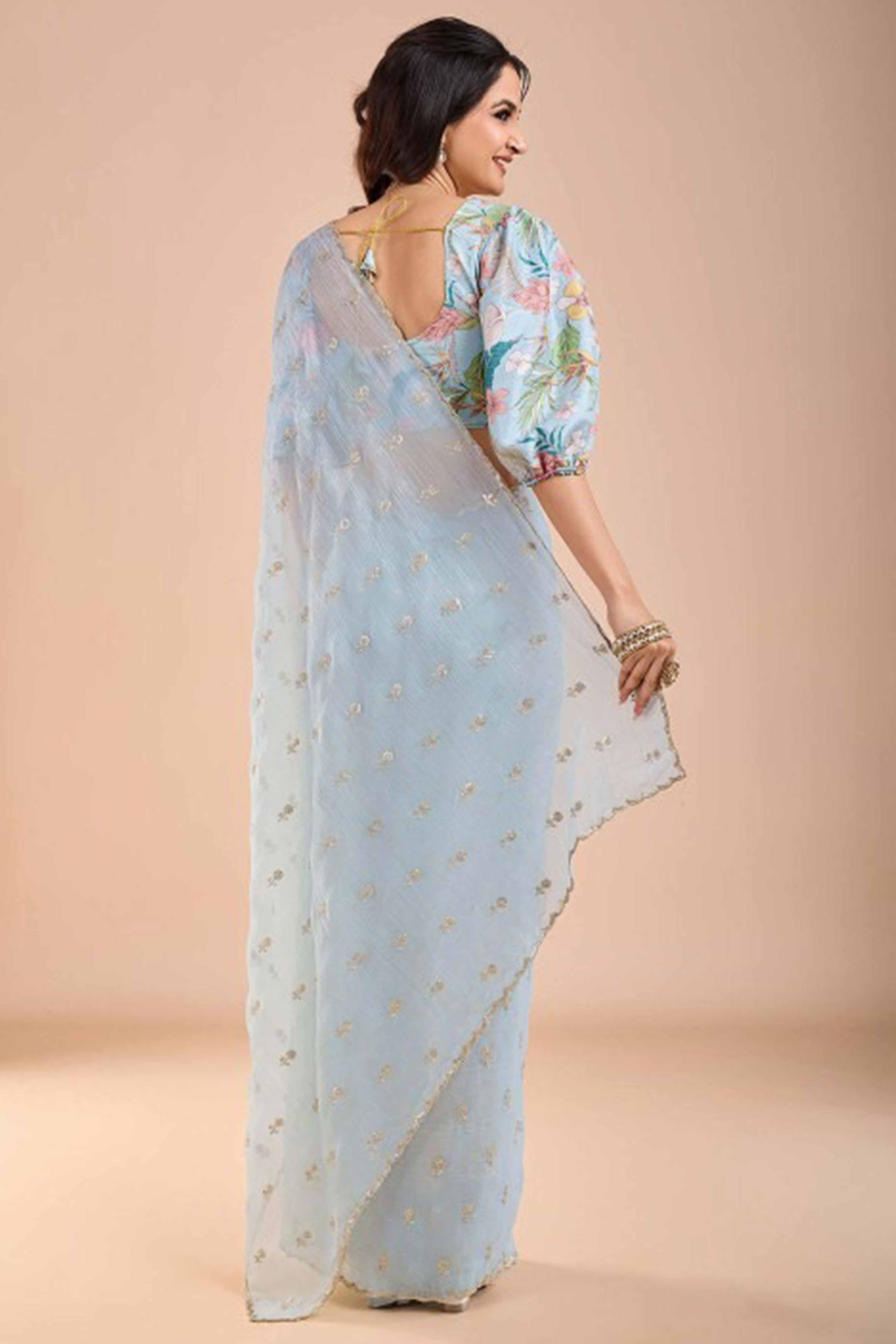 Light Blue Crunchy Saree Adorned With Floral Sequins Embroidery & Graceful Border Finish