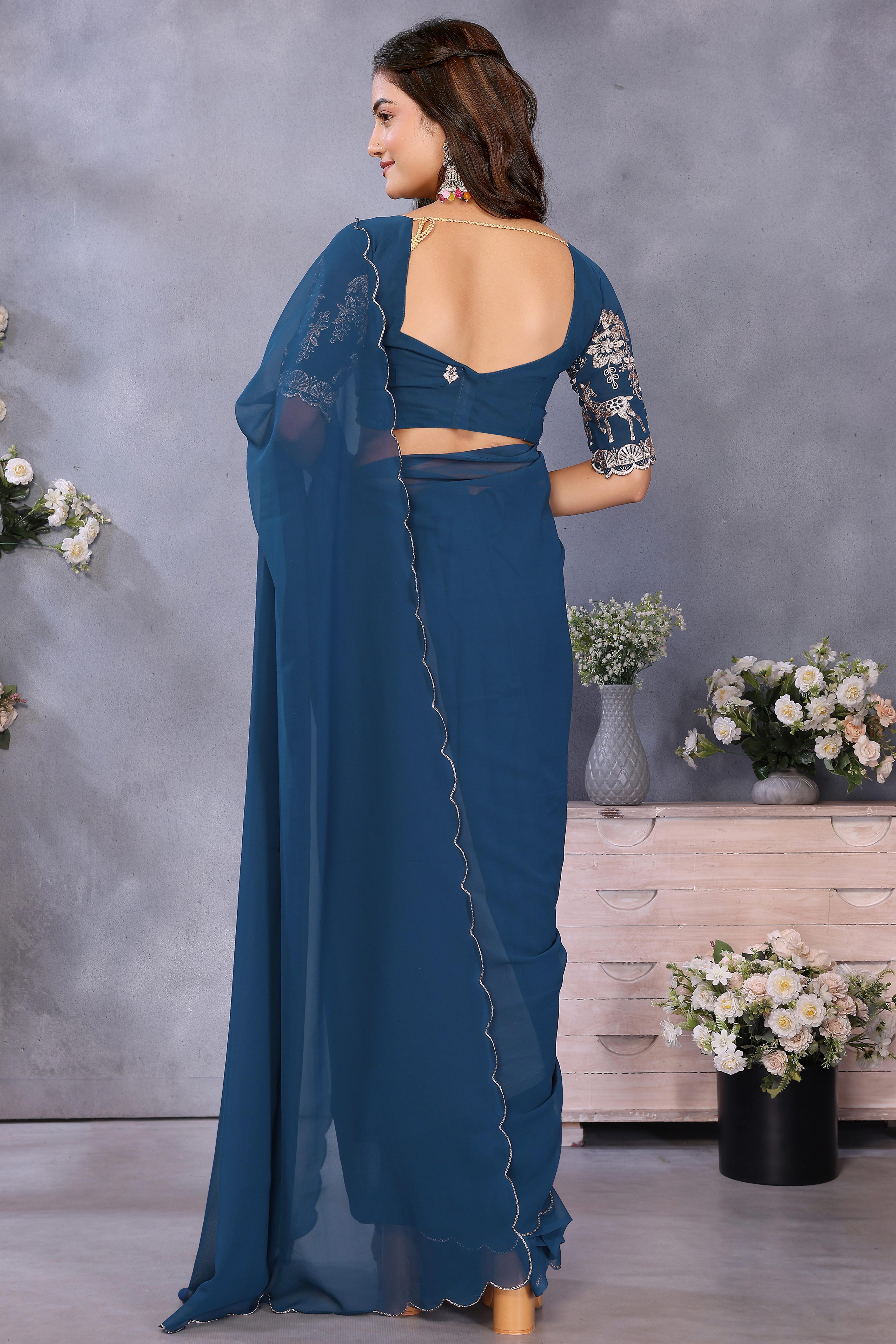 Sophisticated Teal Party Wear Saree in Flowing Georgette Fabric With Embellished Blouse