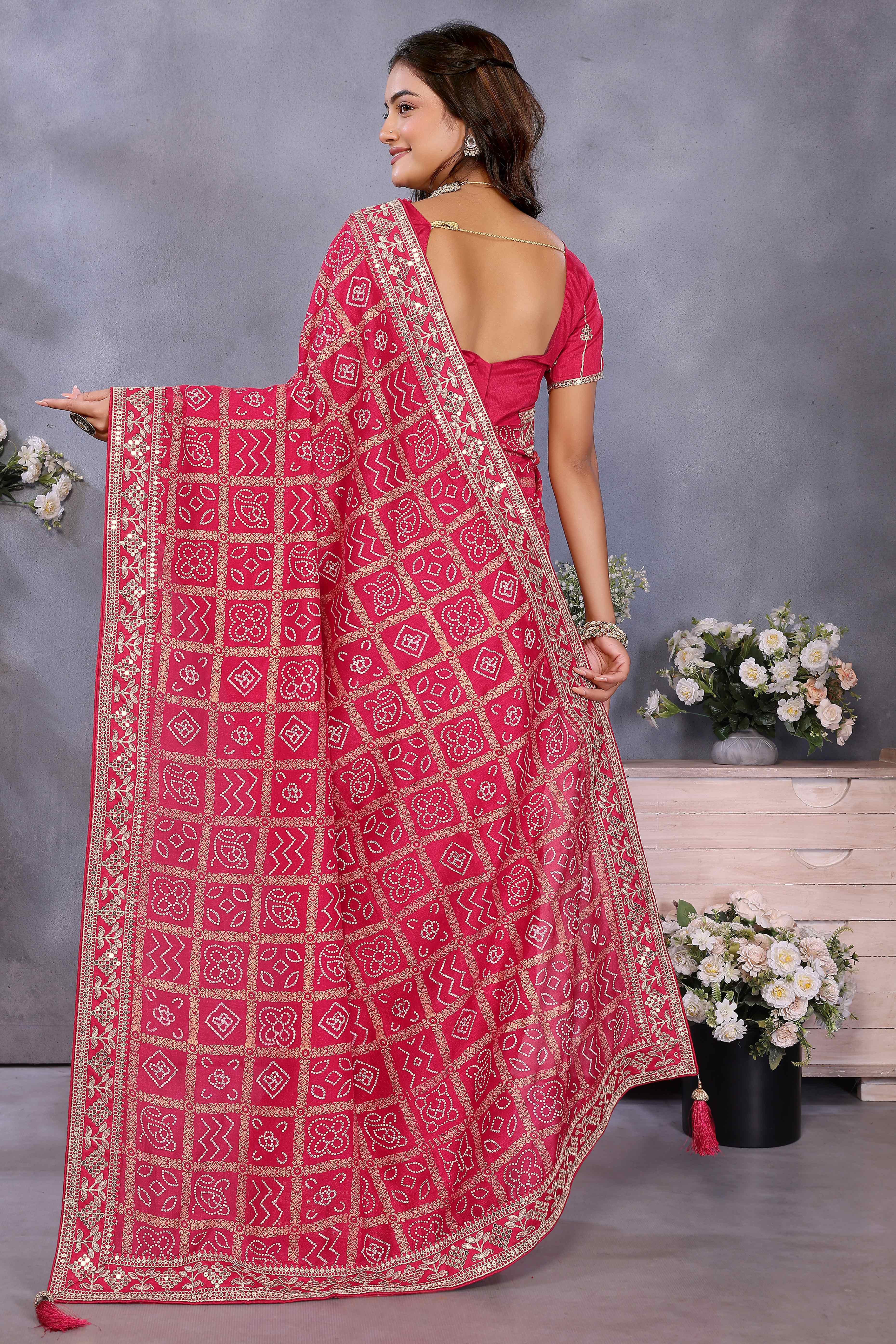 Pink Vichitra Silk Saree Highlighted with Bandhani Print and Sequins Embroidered Border
