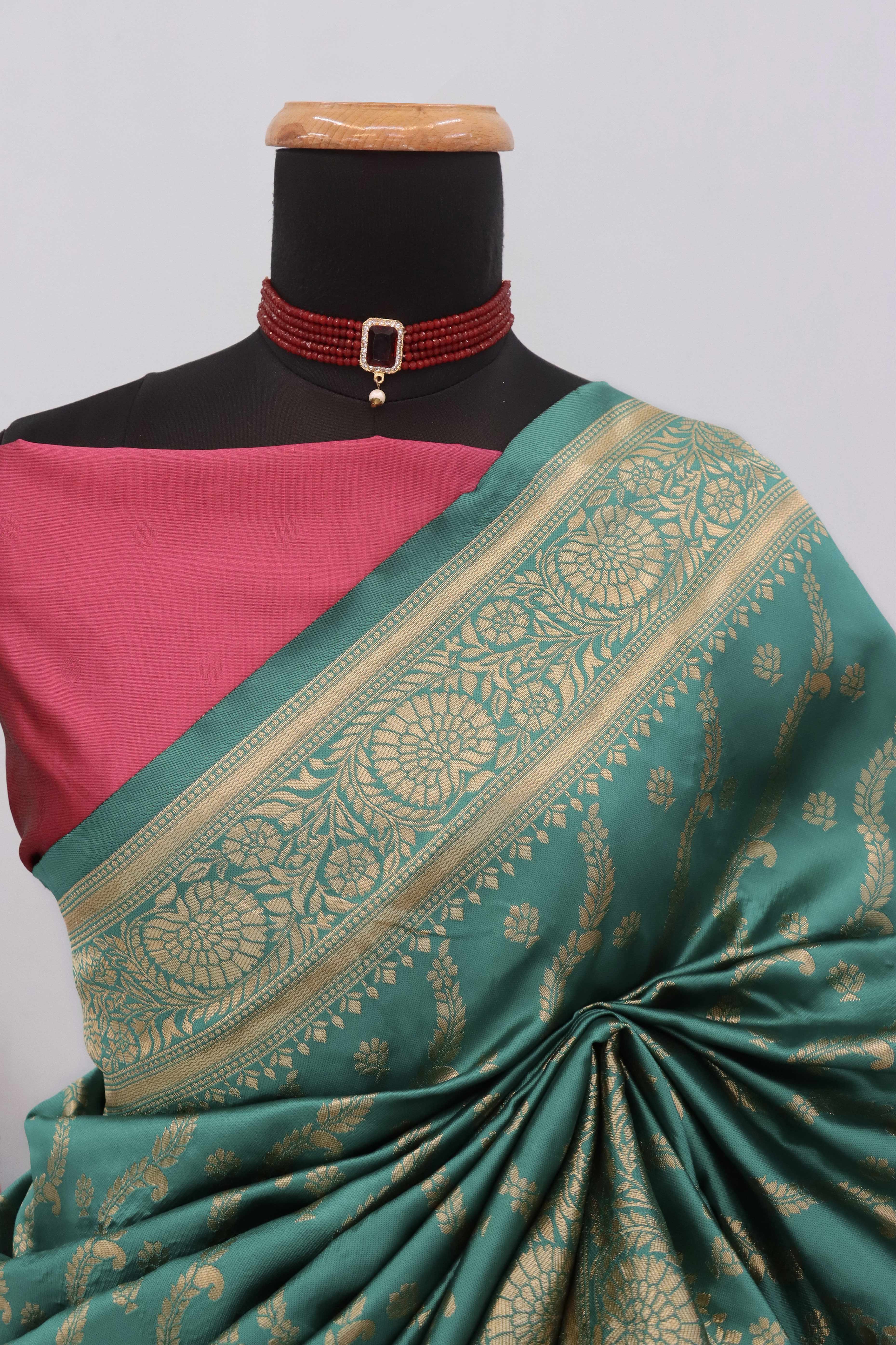 Graceful Rama Blue Banarasi Silk Saree Featuring Intricate Floral Zari Weaving Work