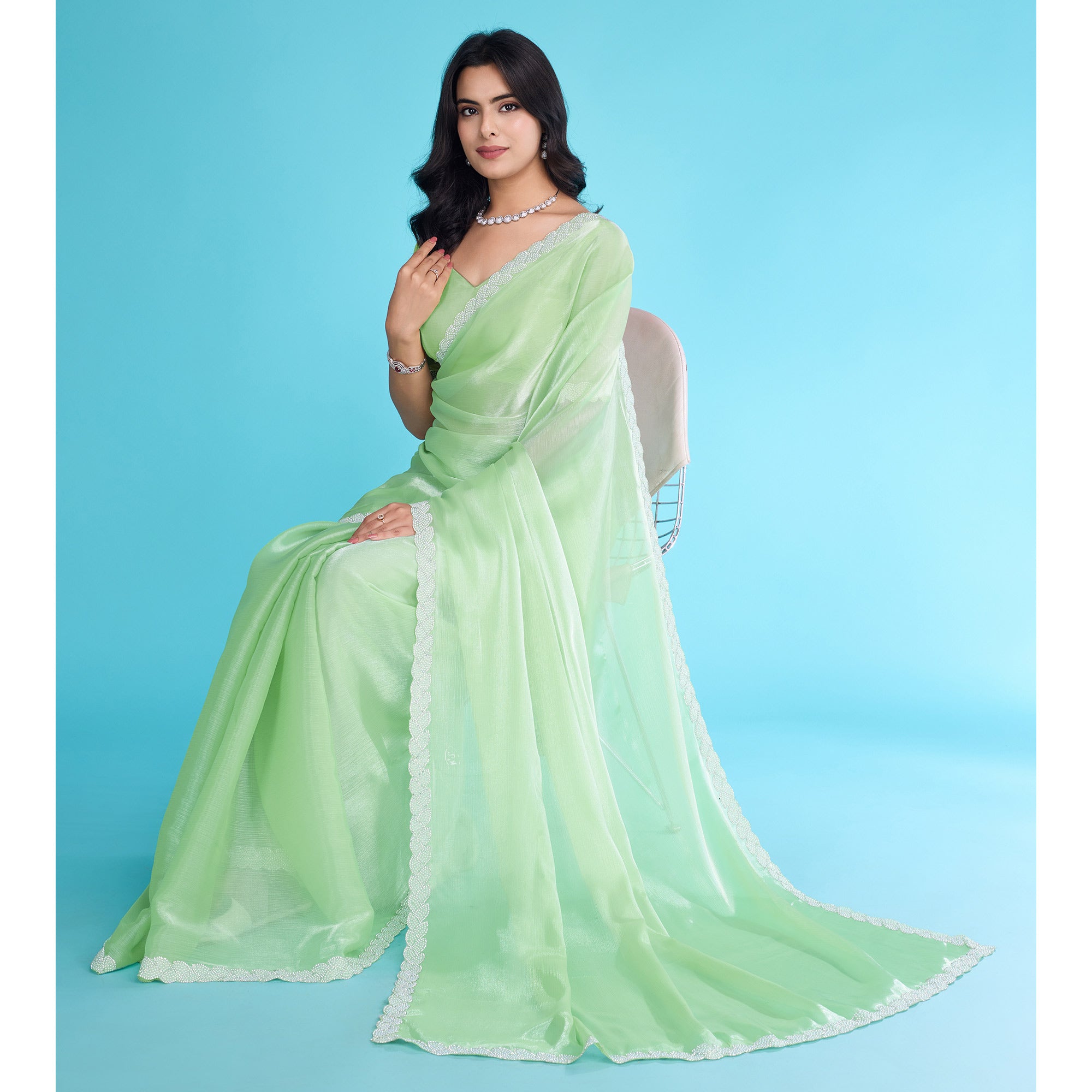Green Solid With Zarkan & Ceramic Pearl Diamond Lace Tissue Saree