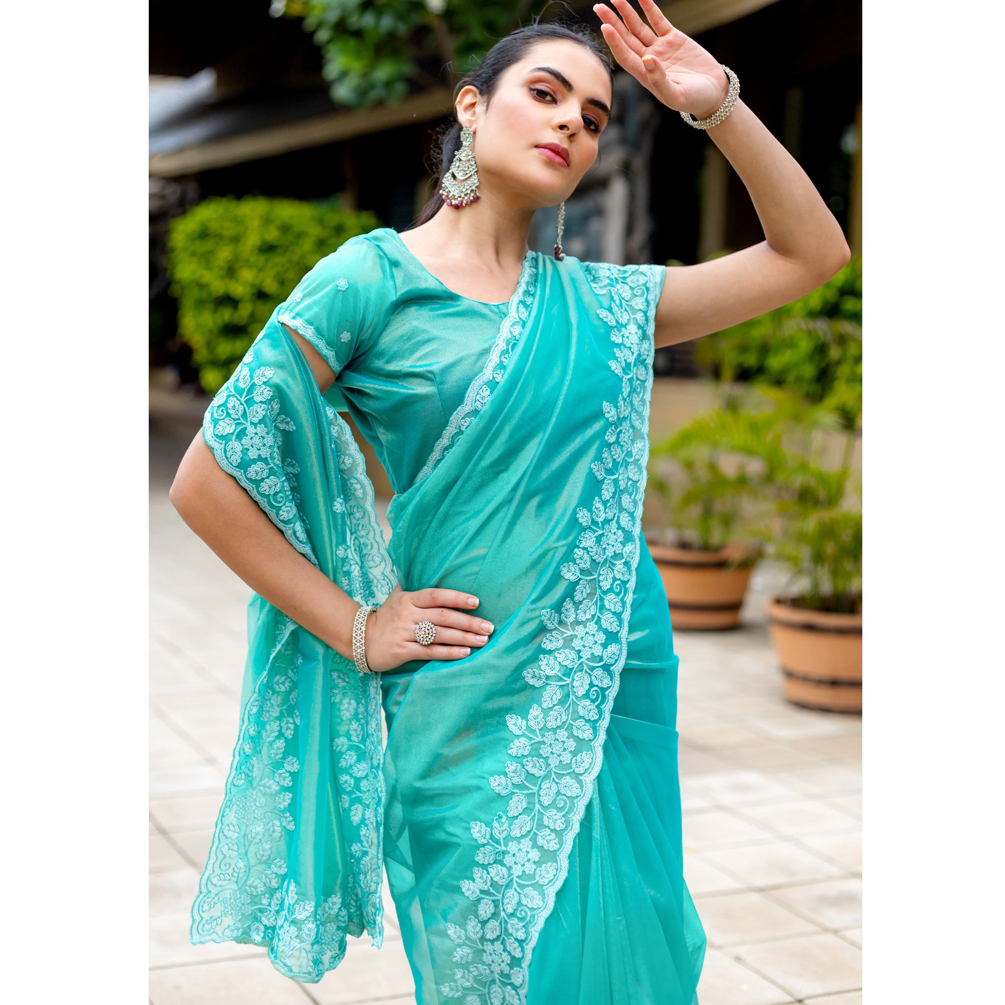 Turquoise Floral Sequins Embroidered Twill Net Saree