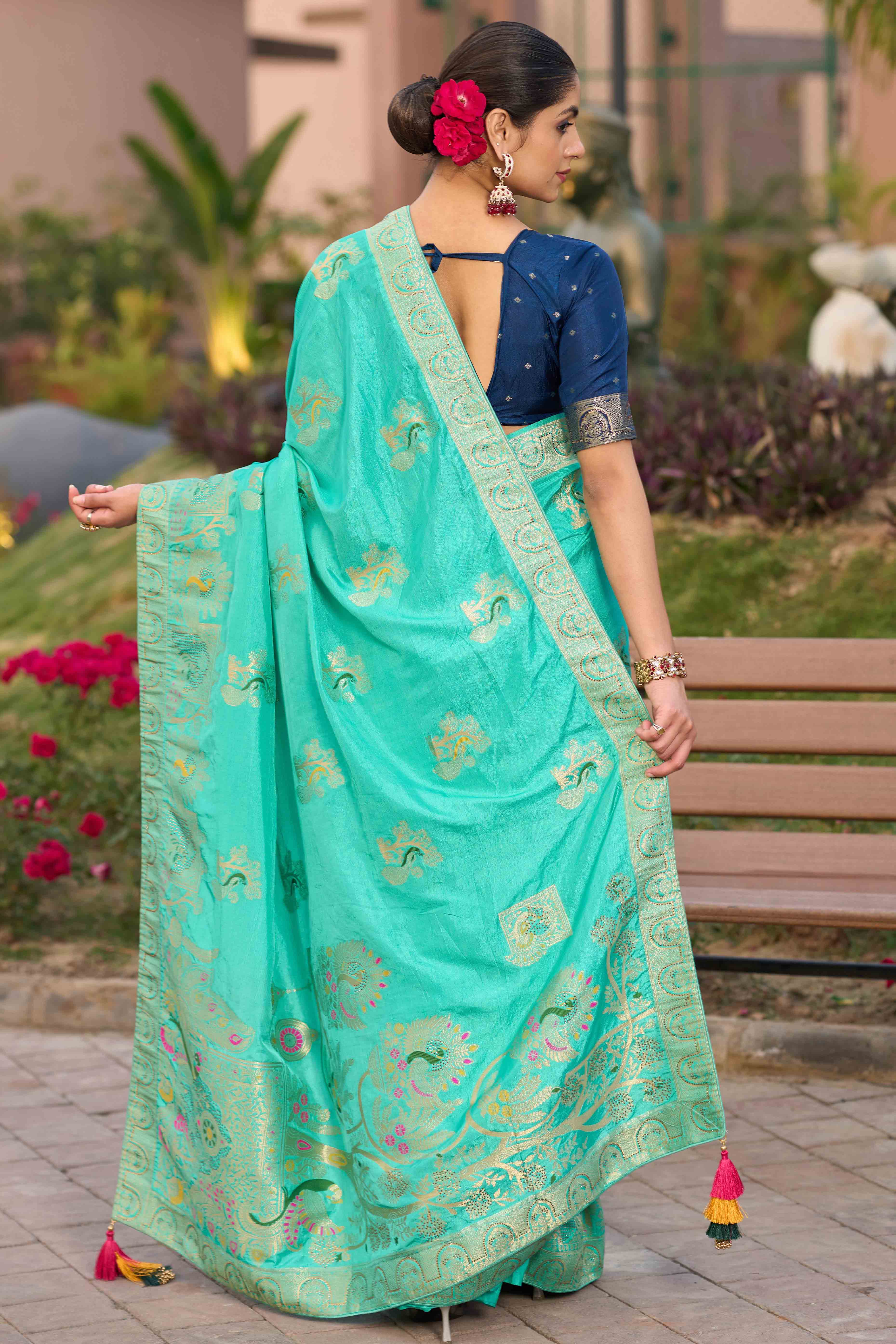 Radiant Turquoise Dola Silk Saree With Intricate Zari Weaving & Swarovski Accents