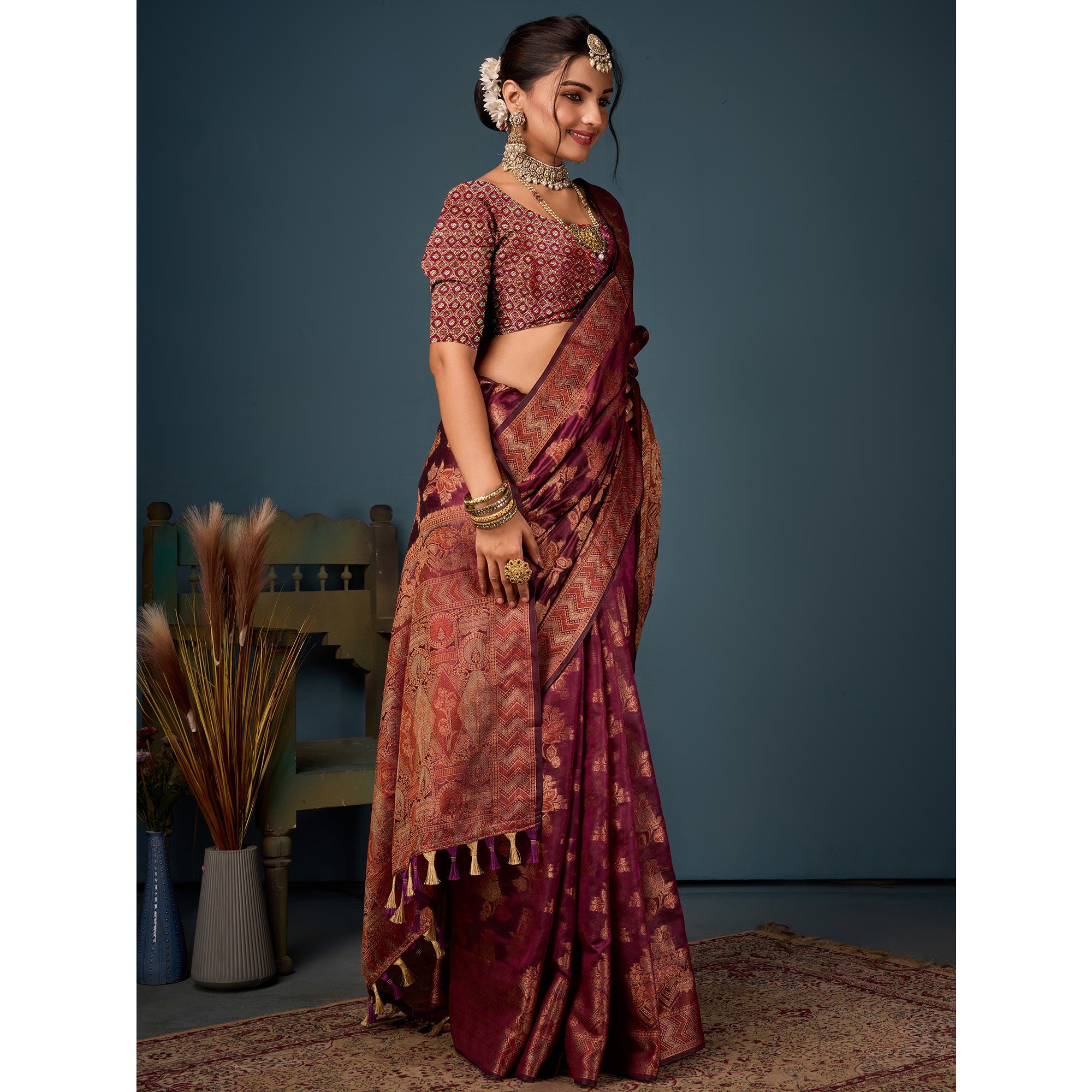 Wine Floral Woven Organza Saree With Tassels