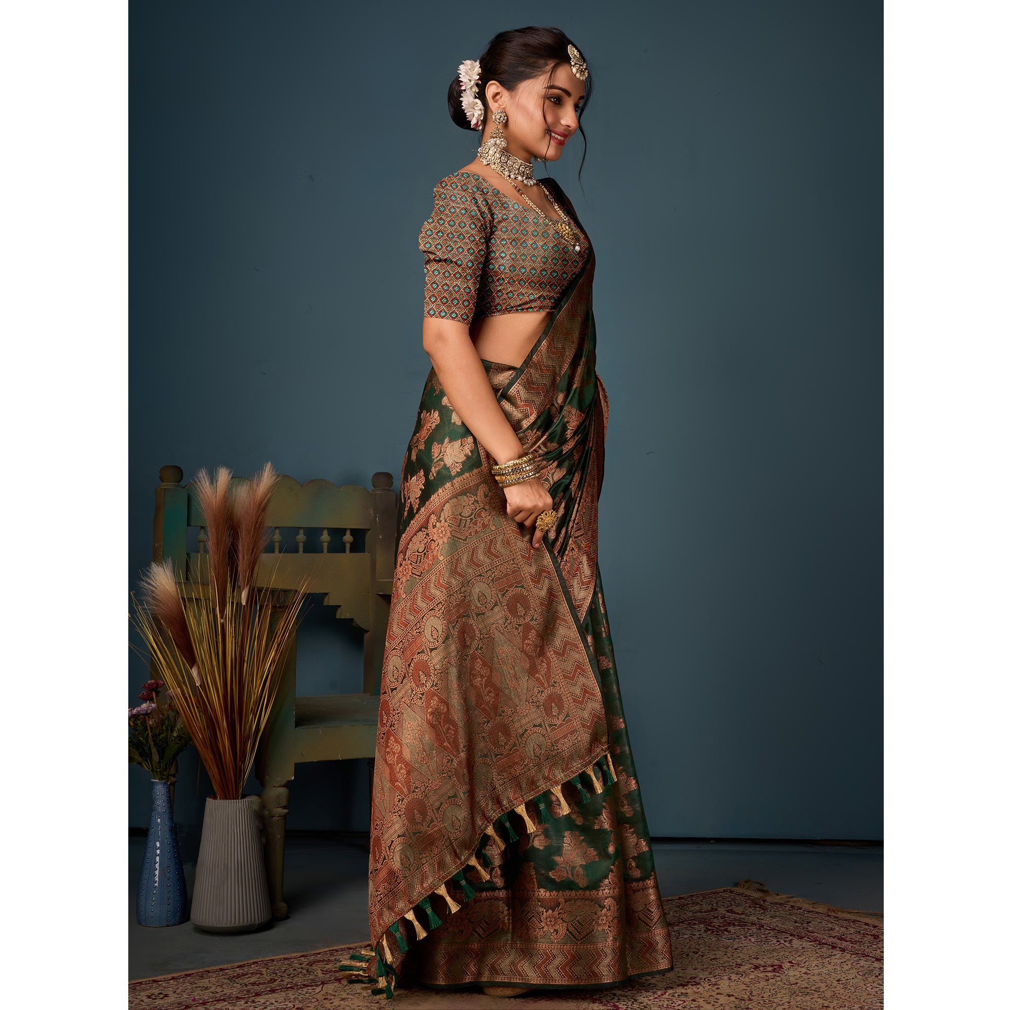 Bottle Green Floral Woven Organza Saree With Tassels