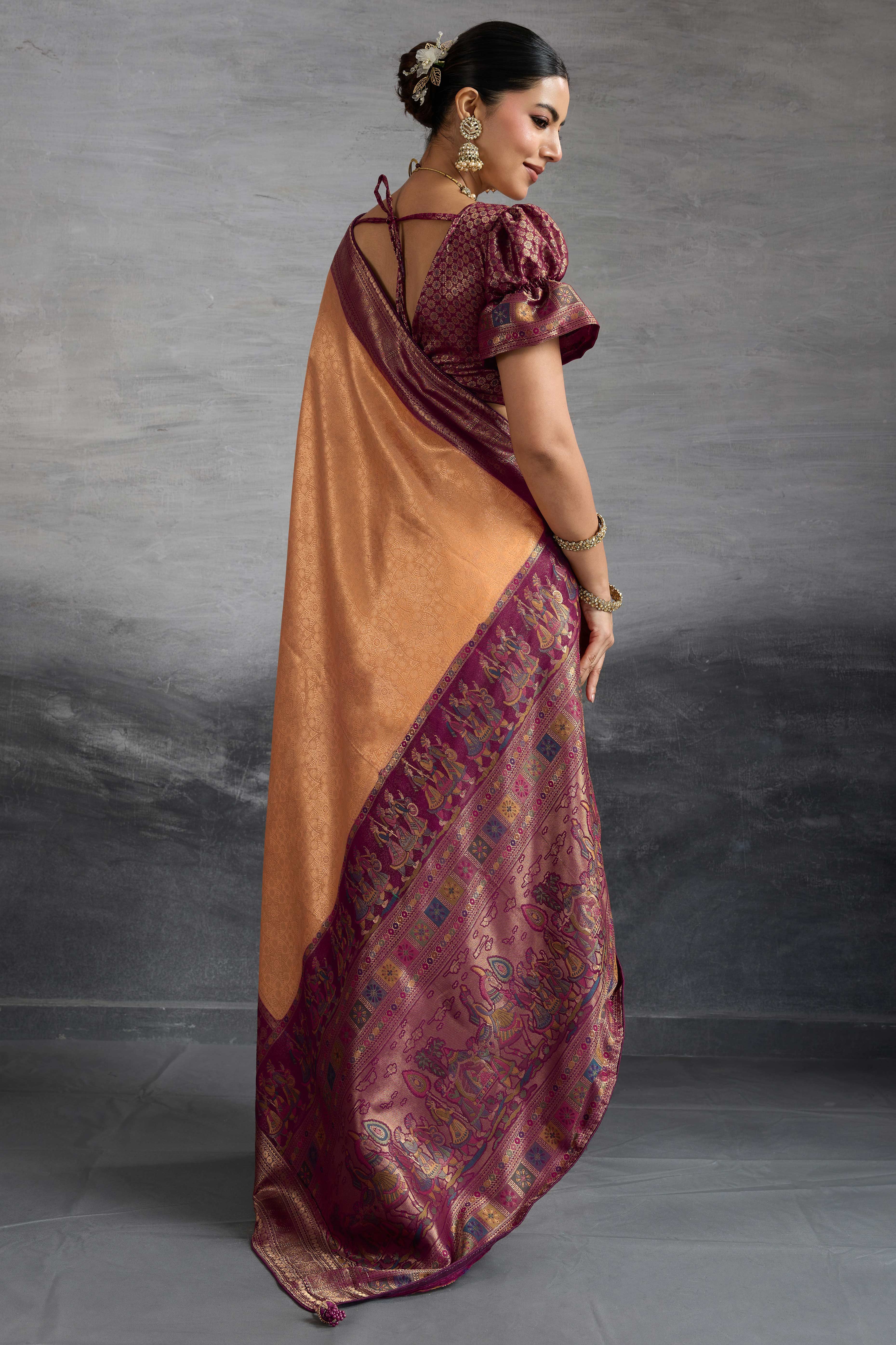 Peach Silk Kanjivaram Silk Saree Enhanced With Meenakari Weaving Borders