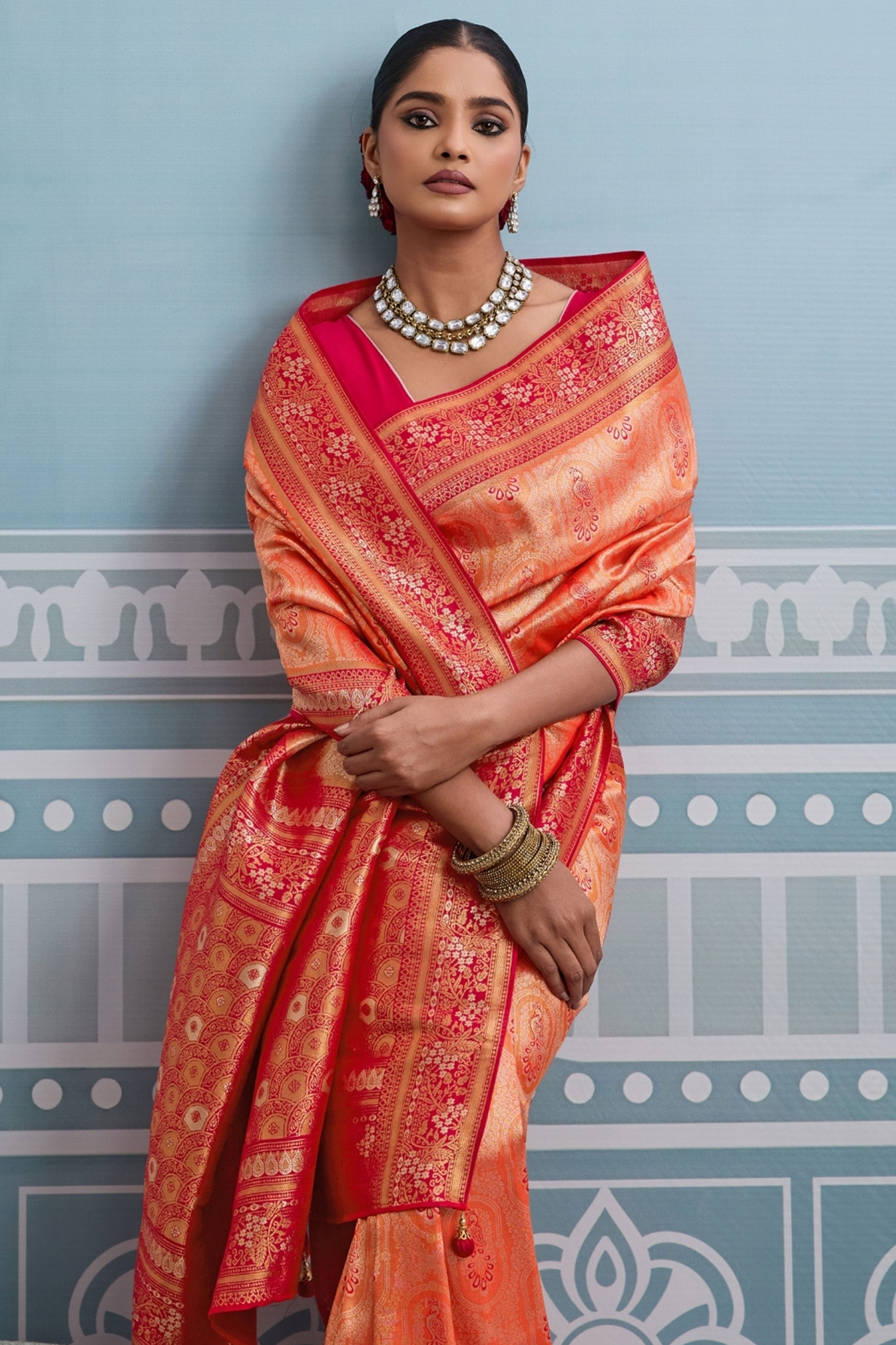 Orange Kanjivaram Silk Saree Accented with Traditional Zari Work