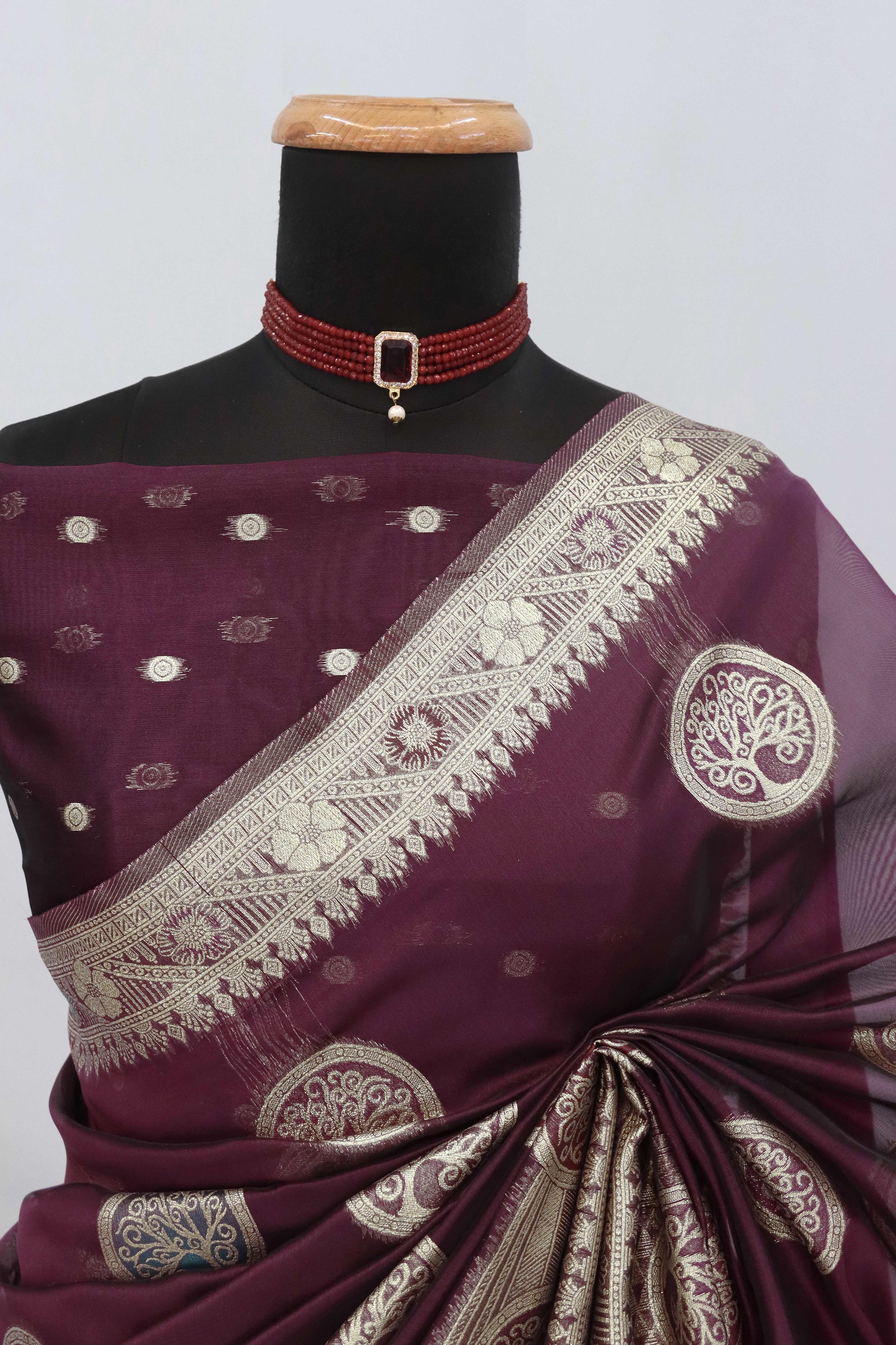 Charming Wine Zari Woven Floral Organza Saree Accented With Digital Printed Pallu & Latkan