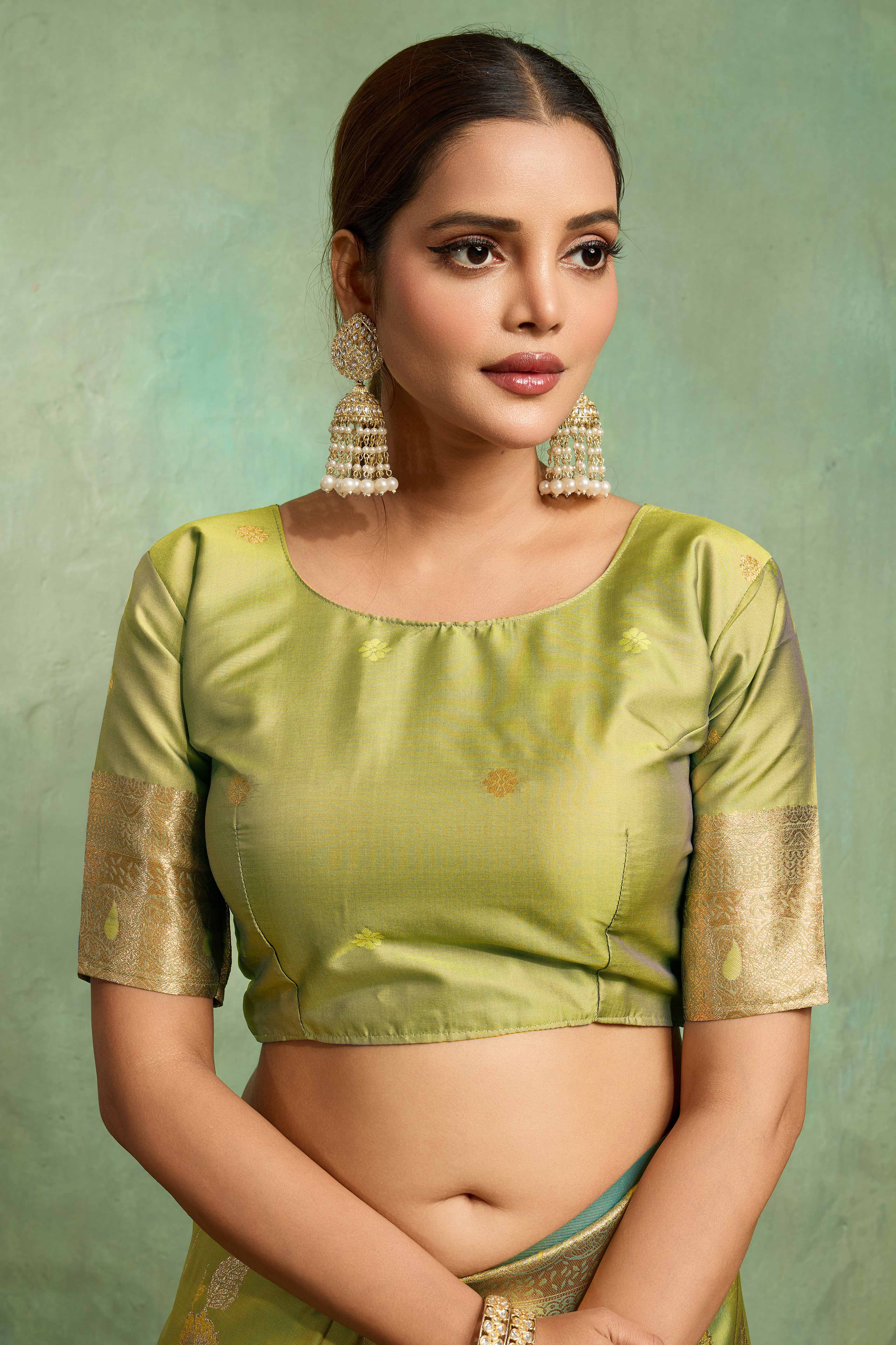 Green Dual Tone Banarasi Silk Saree Accented with Meenakari Weaves