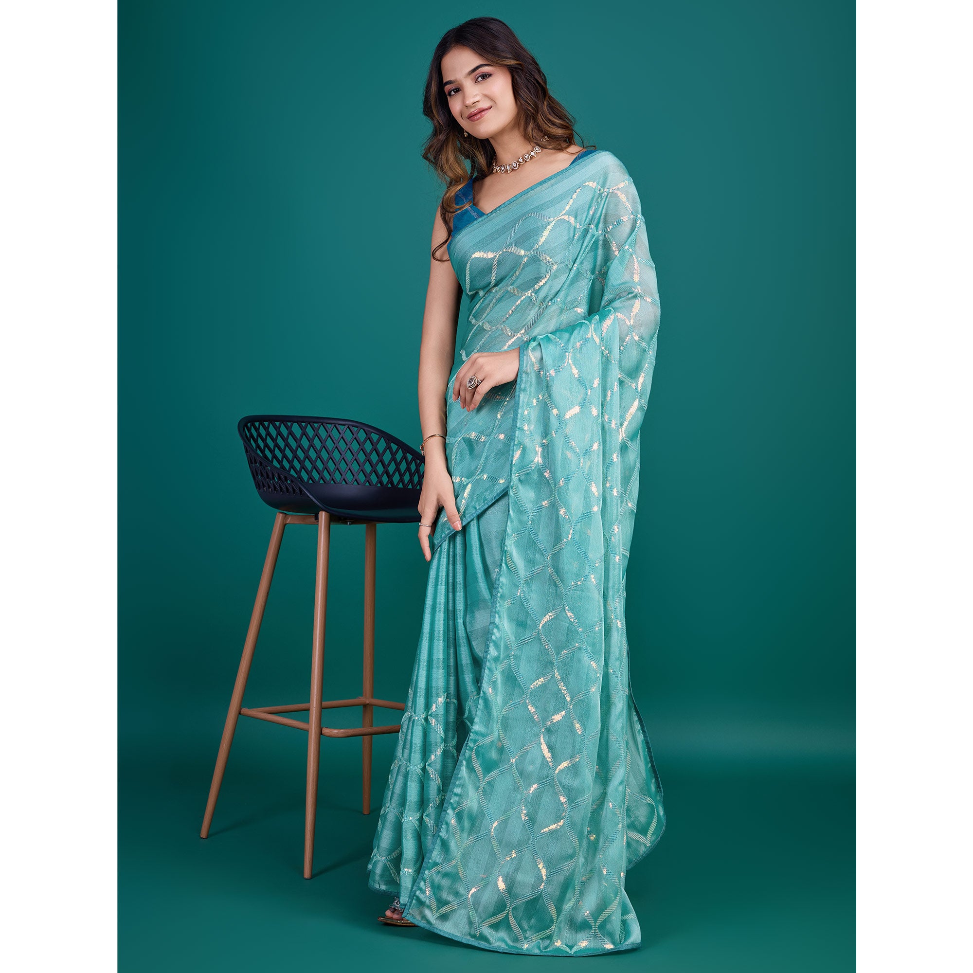 Turquoise Sequins Embroidered Georgette Saree