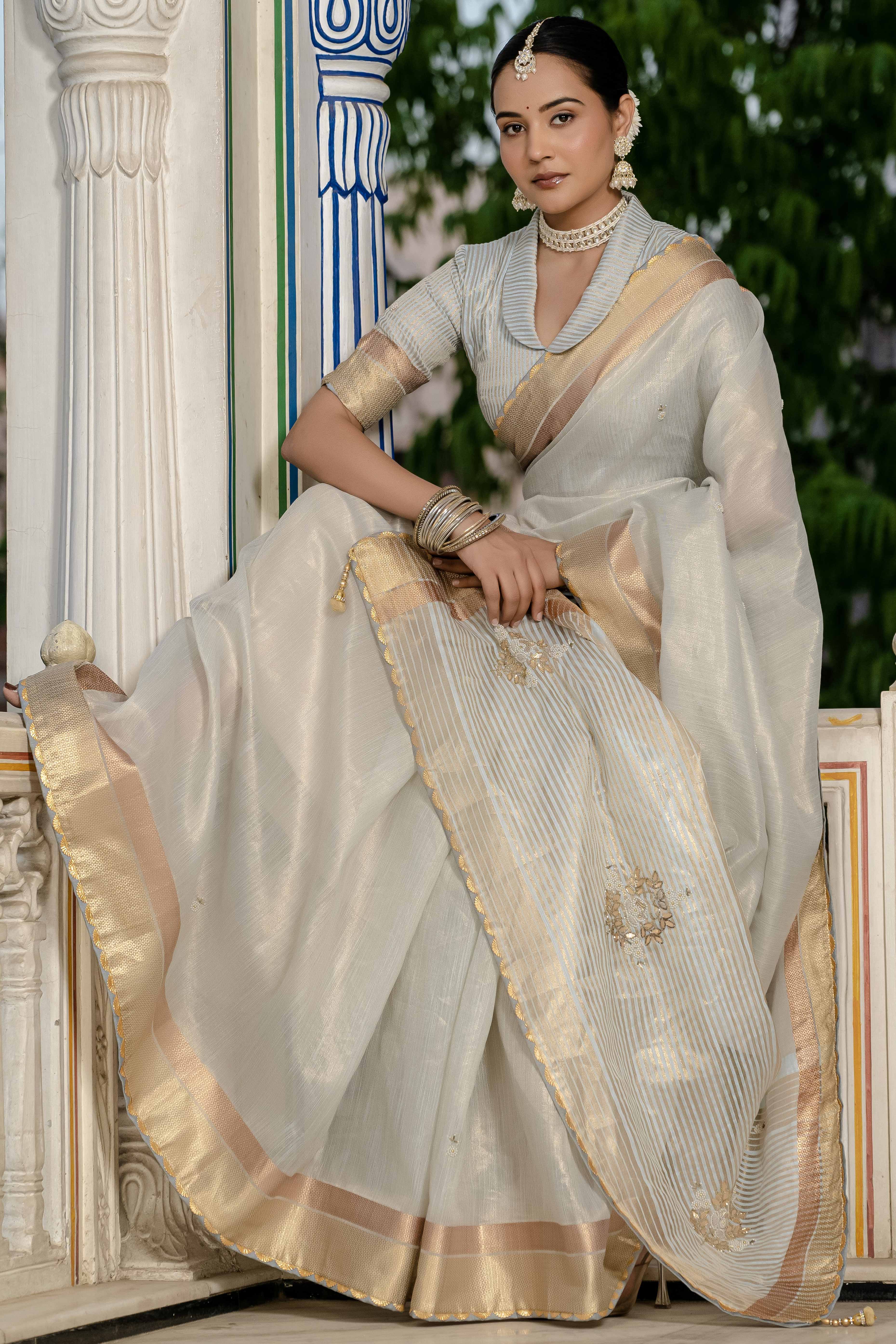 Sky Blue Tissue Linen Saree Featuring Intricate Zari and Beadwork