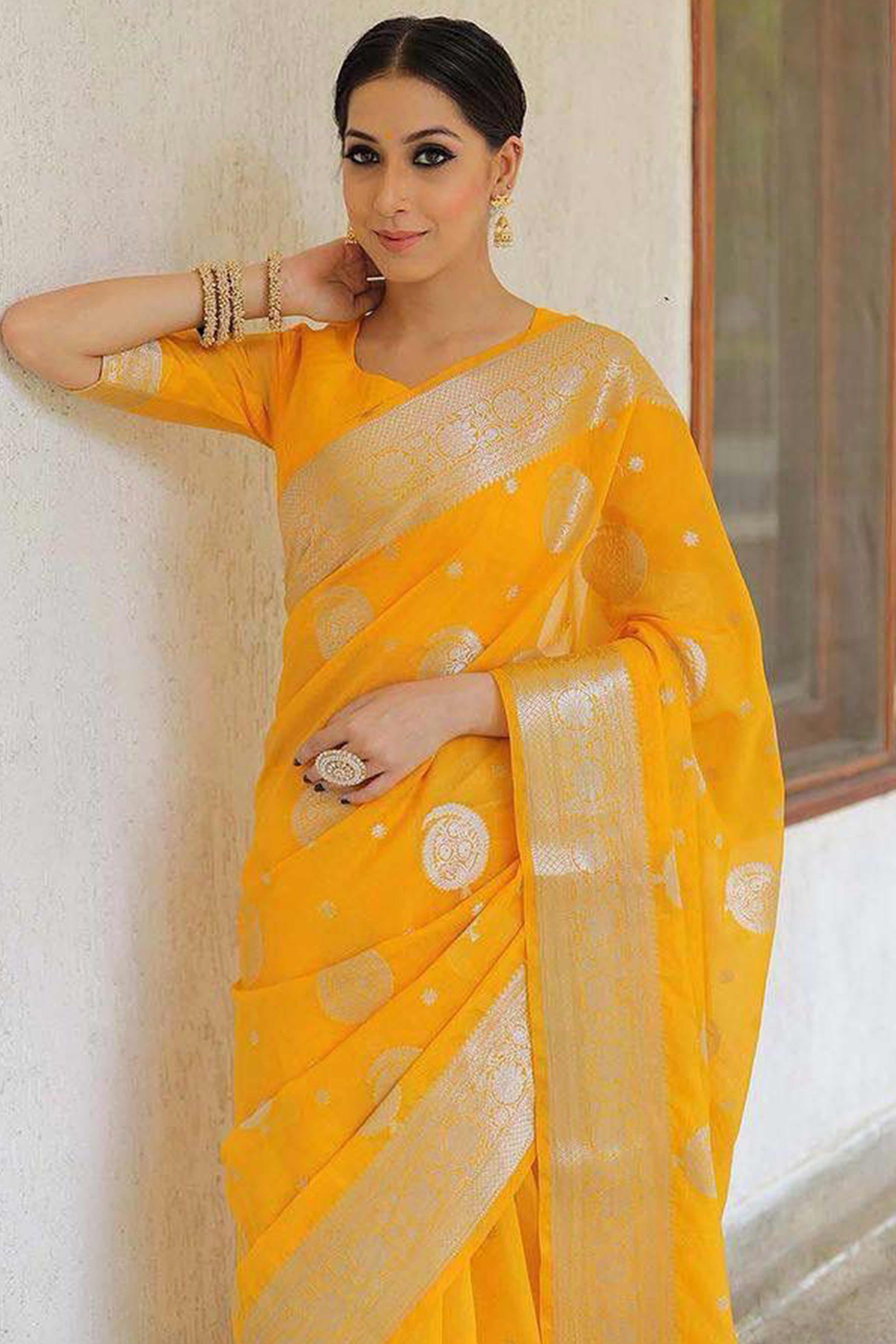 Vibrant Yellow Floral Zari Woven Lichi Banarasi Silk Saree With Rich Detailing
