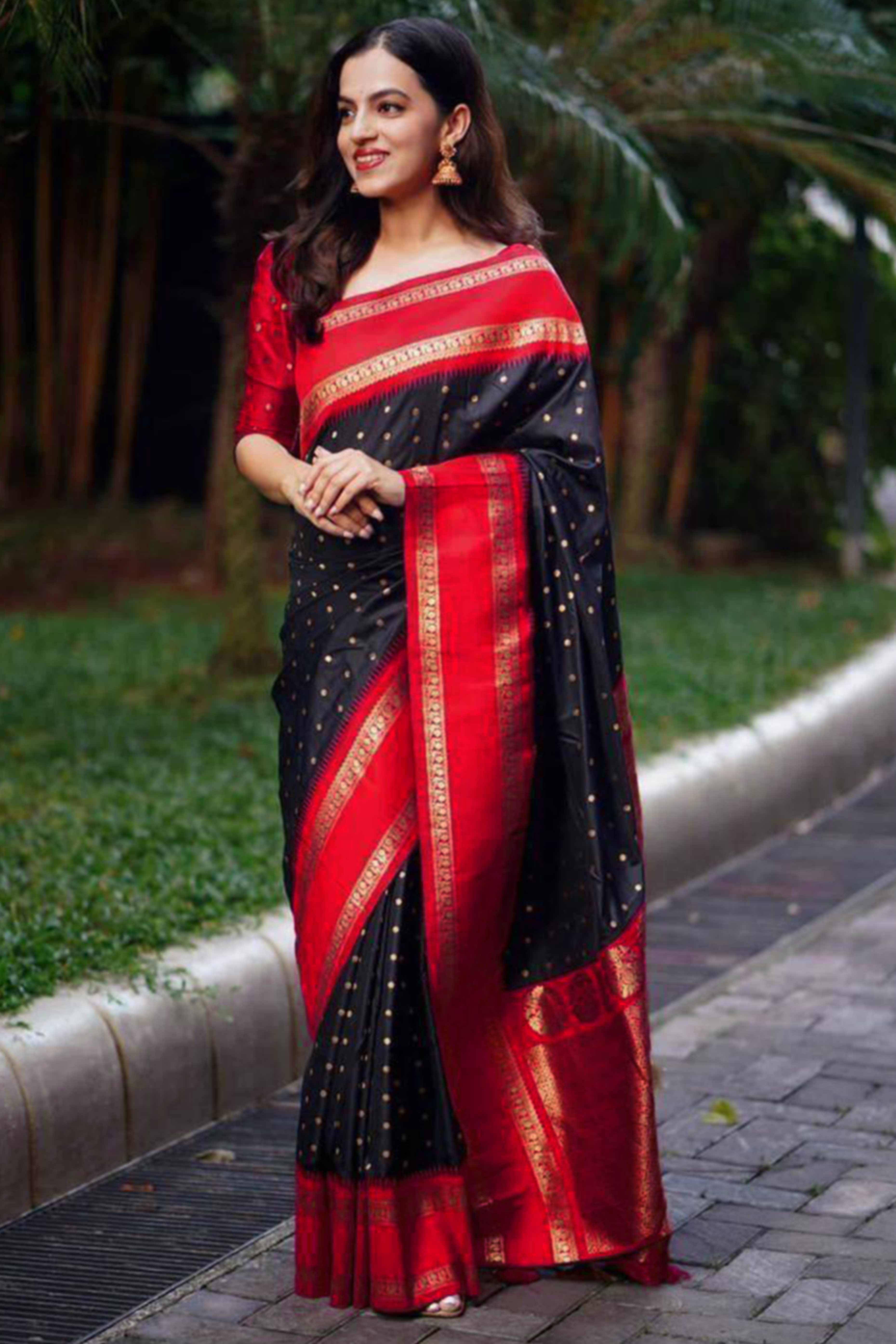 Striking Black & Red Zari Woven Lichi Banarasi Silk Saree With Tassel Accents