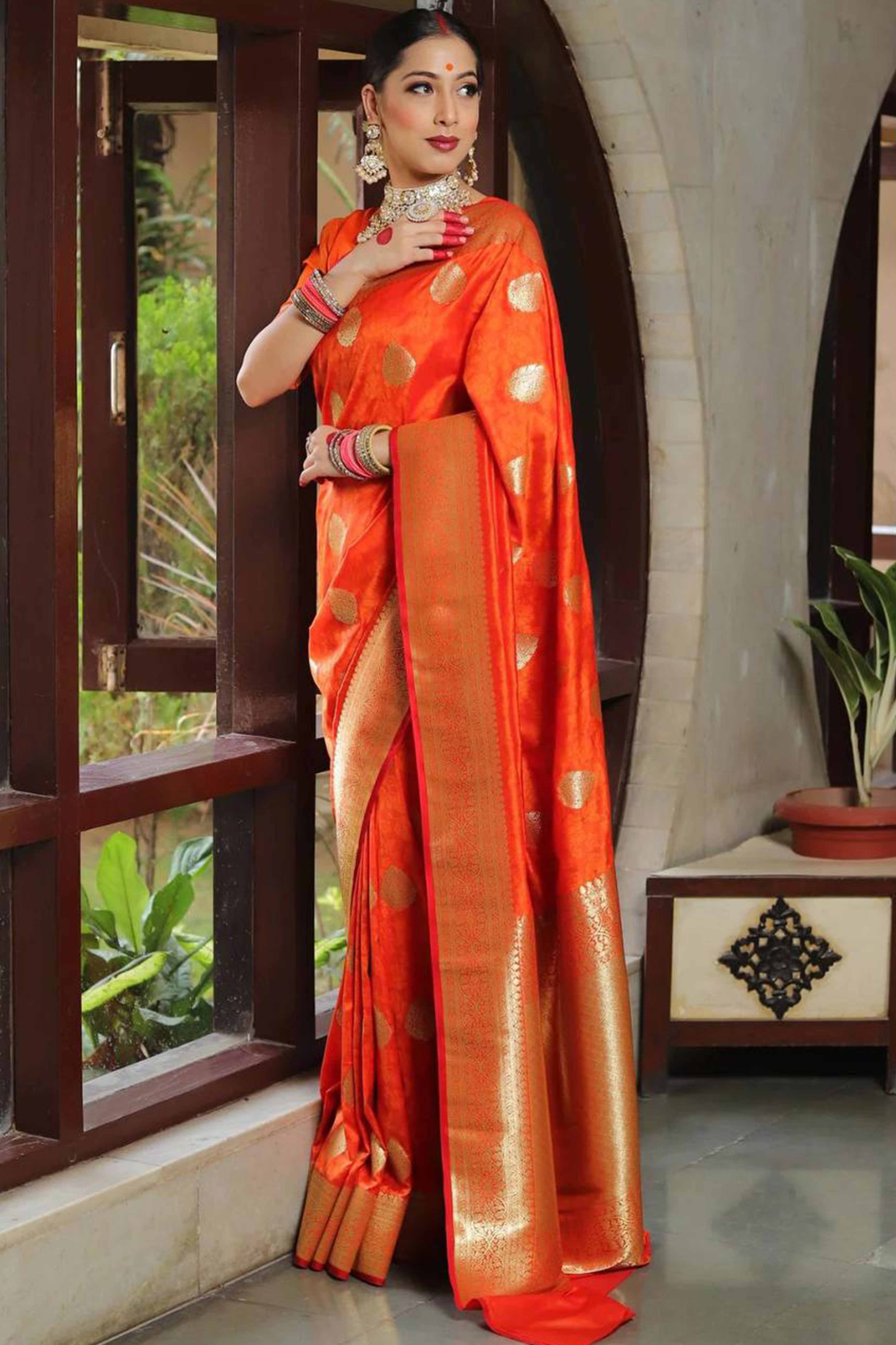 Orange Floral Woven Lichi Banarasi Silk Saree