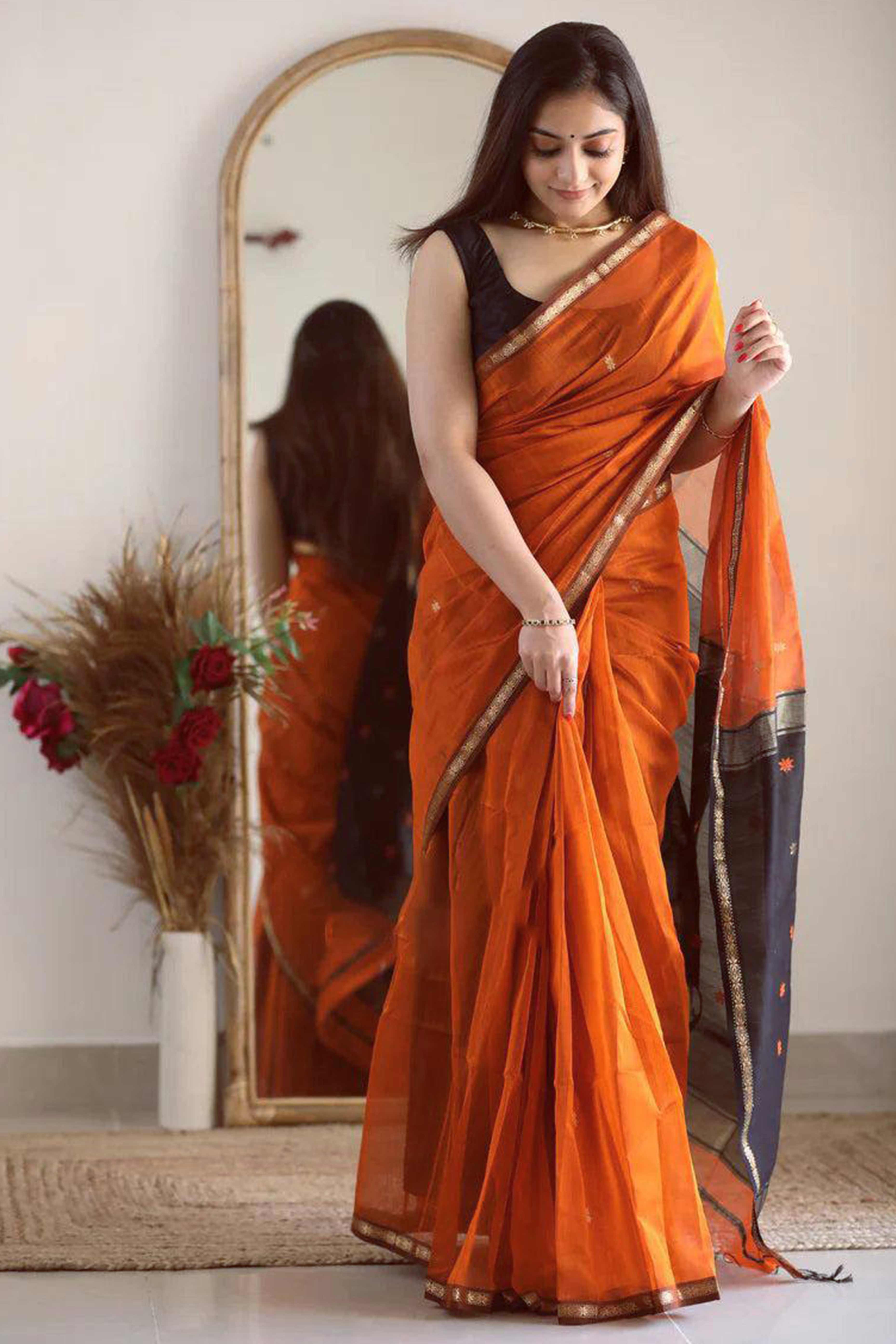 Burnt Orange Linen Cotton Saree with Zari Butti Embellishment