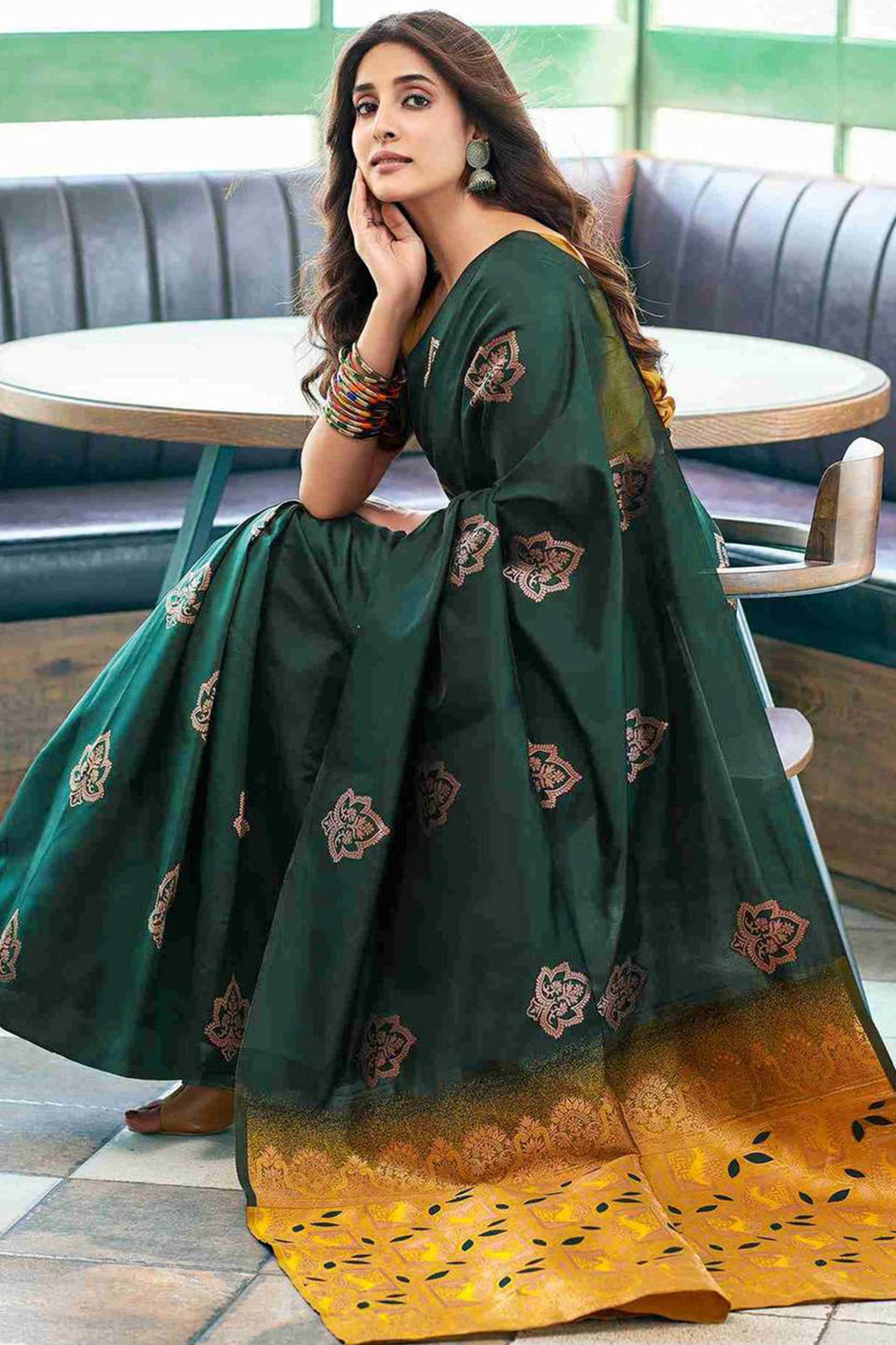 Green Banarasi Silk Saree Adorned with Elegant Floral Zari Weaving