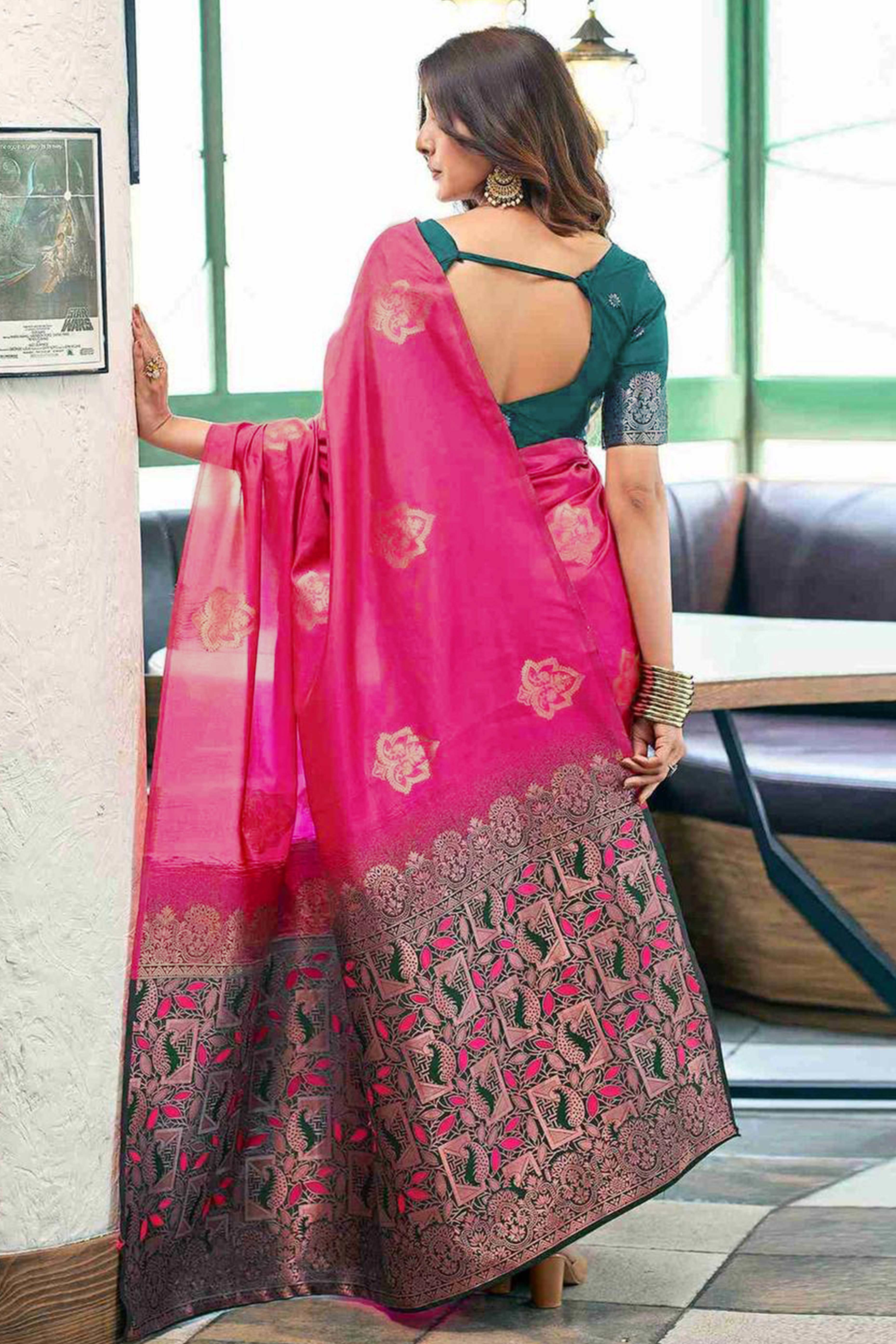 Pink Banarasi Silk Saree Adorned with Elegant Floral Zari Weaving