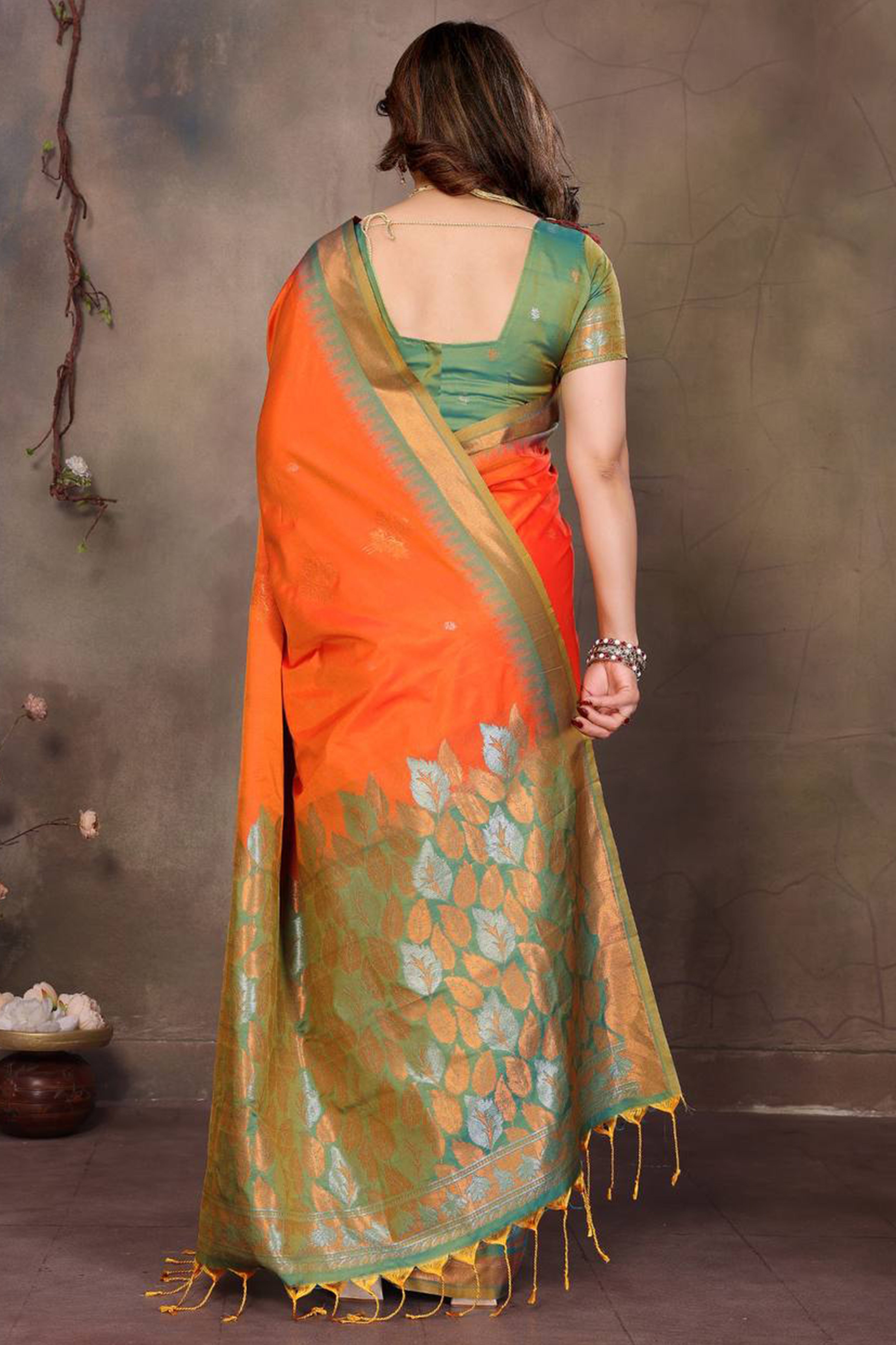 Orange Leaf & Floral Motif Banarasi Silk Saree With Luxurious Zari Weaving Two Tone Weaving