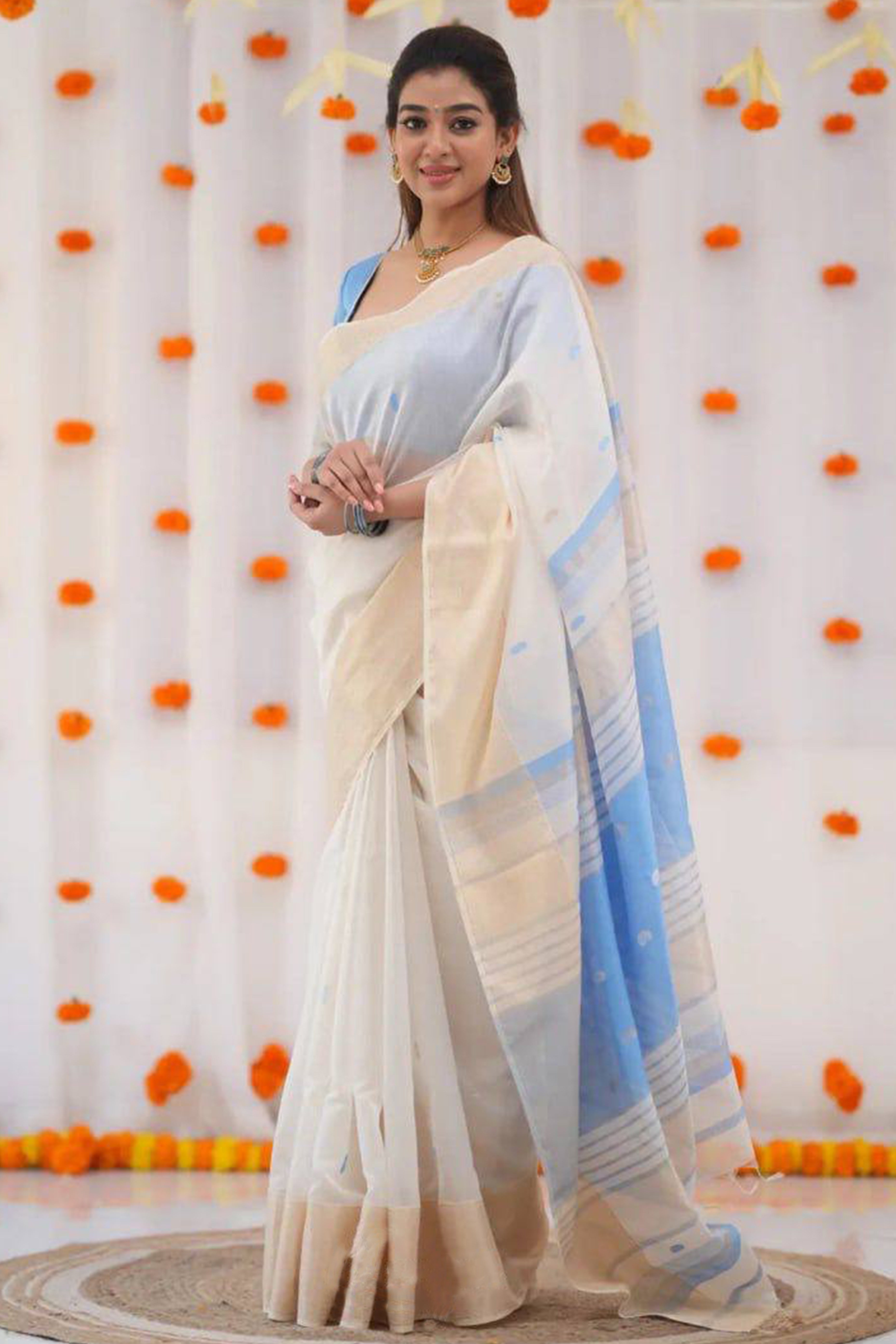 White and Blue Zari-Woven Linen Cotton Saree Offering a Refined Festive Look