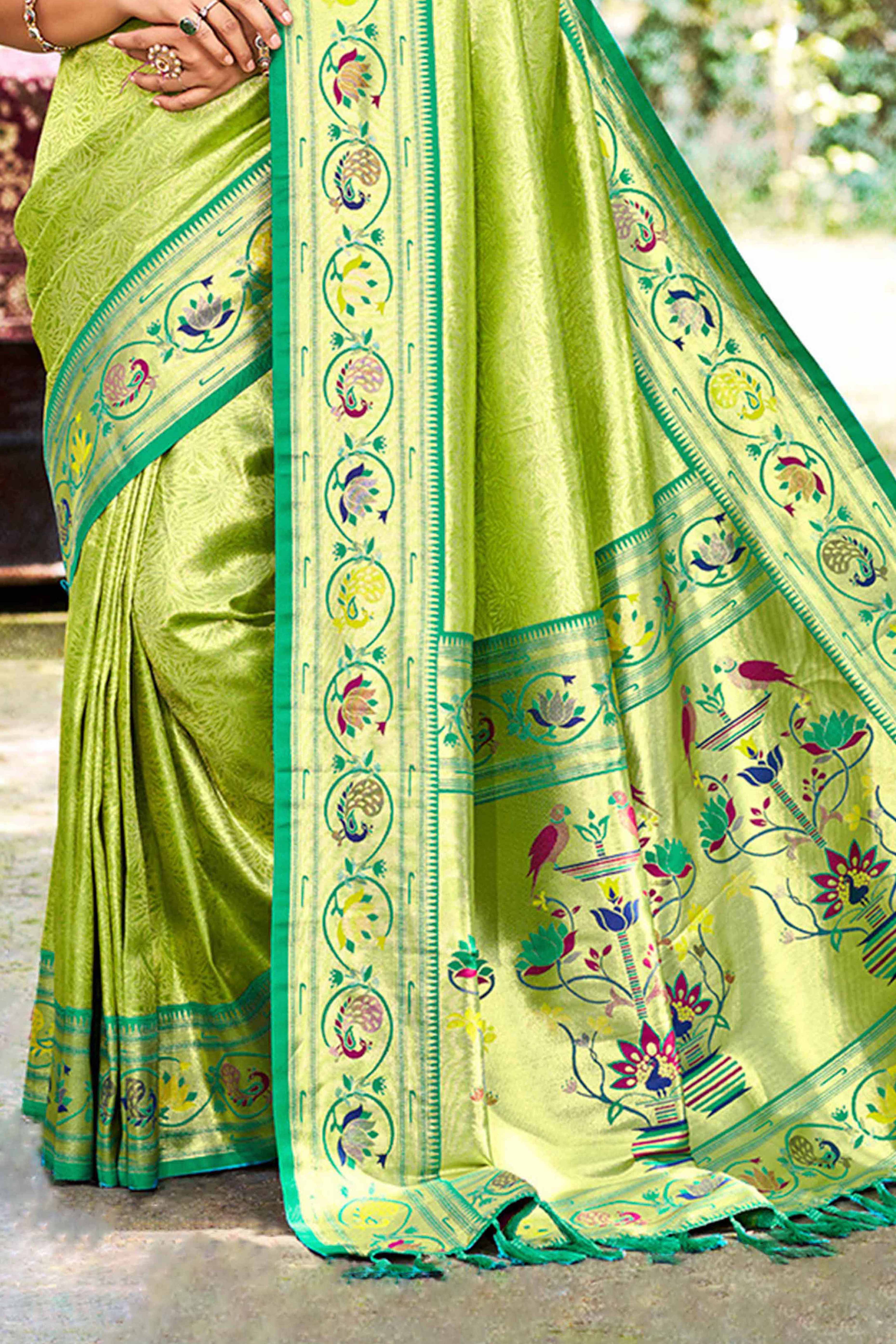 Elegant Green Weaving Silk Blend Saree With Stunning Peacock Border & Artistic Parrot Motif Pallu