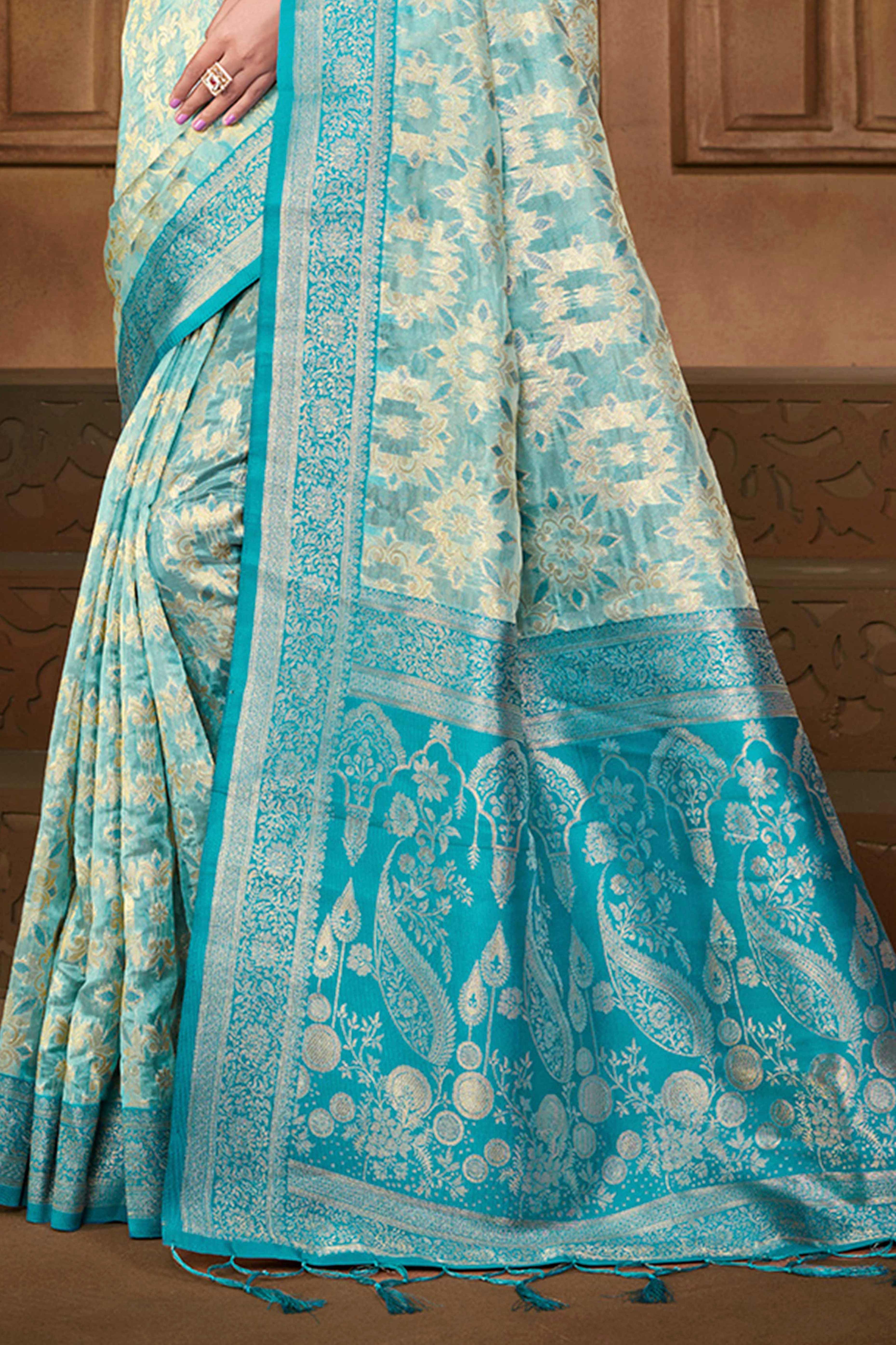 Stunning Blue Floral Weaving Silk Blend Saree Enhanced With A Stylish Tassel Pallu