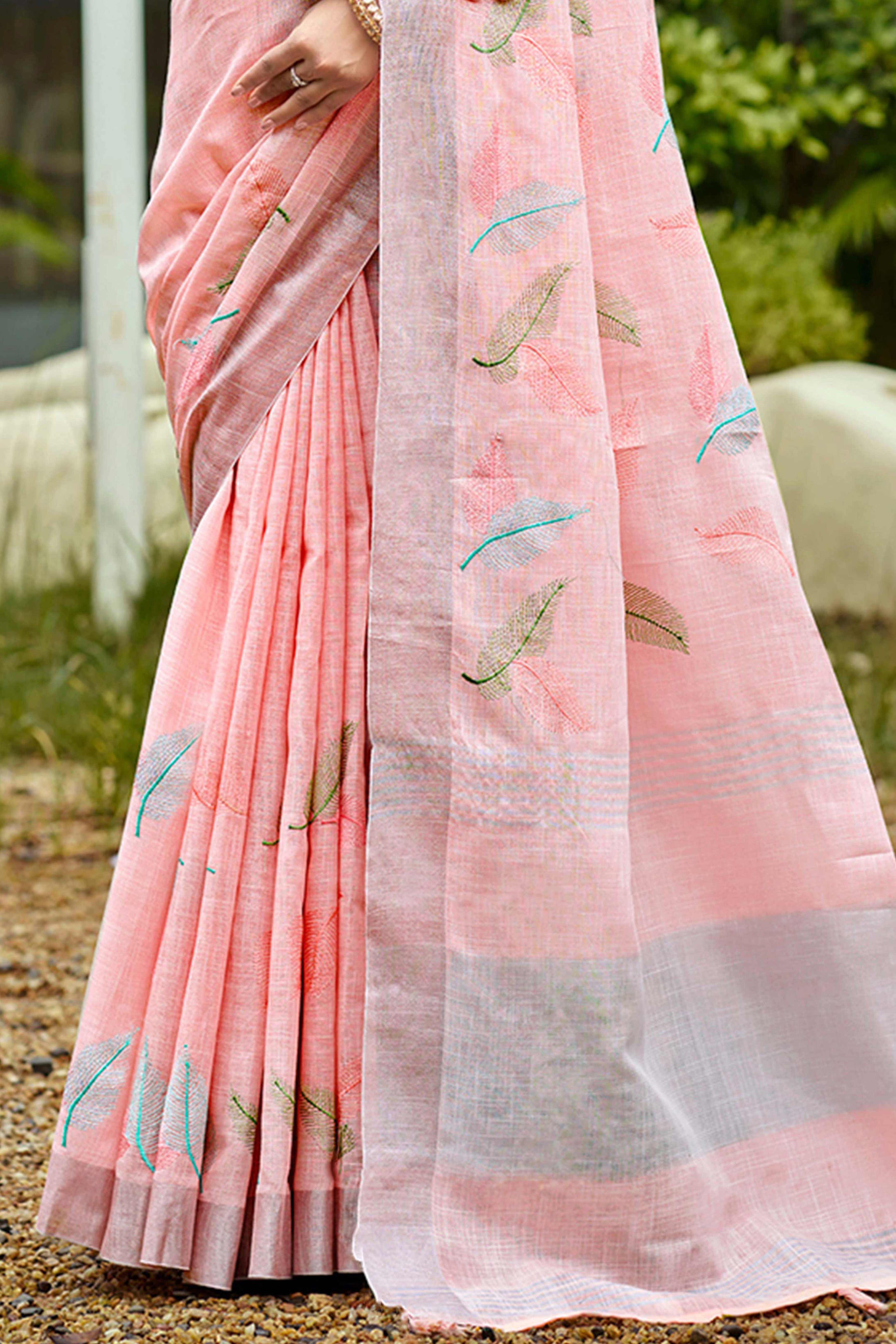Exquisite Light Pink Leaf Motif Thread Embroidered Linen Saree With Elegant Weaving Border