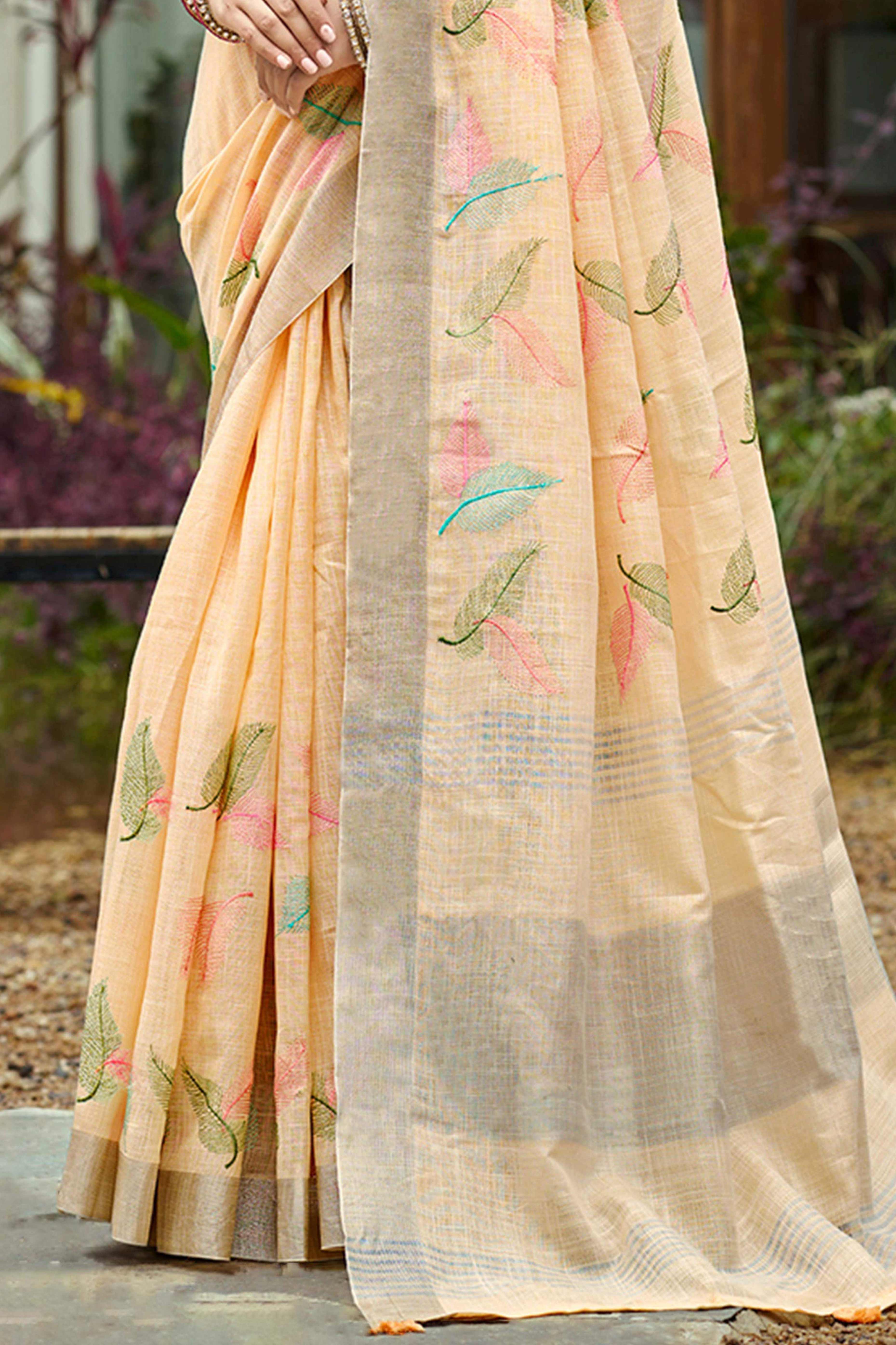Exquisite Light Peach Leaf Motif Thread Embroidered Linen Saree With Elegant Weaving Border