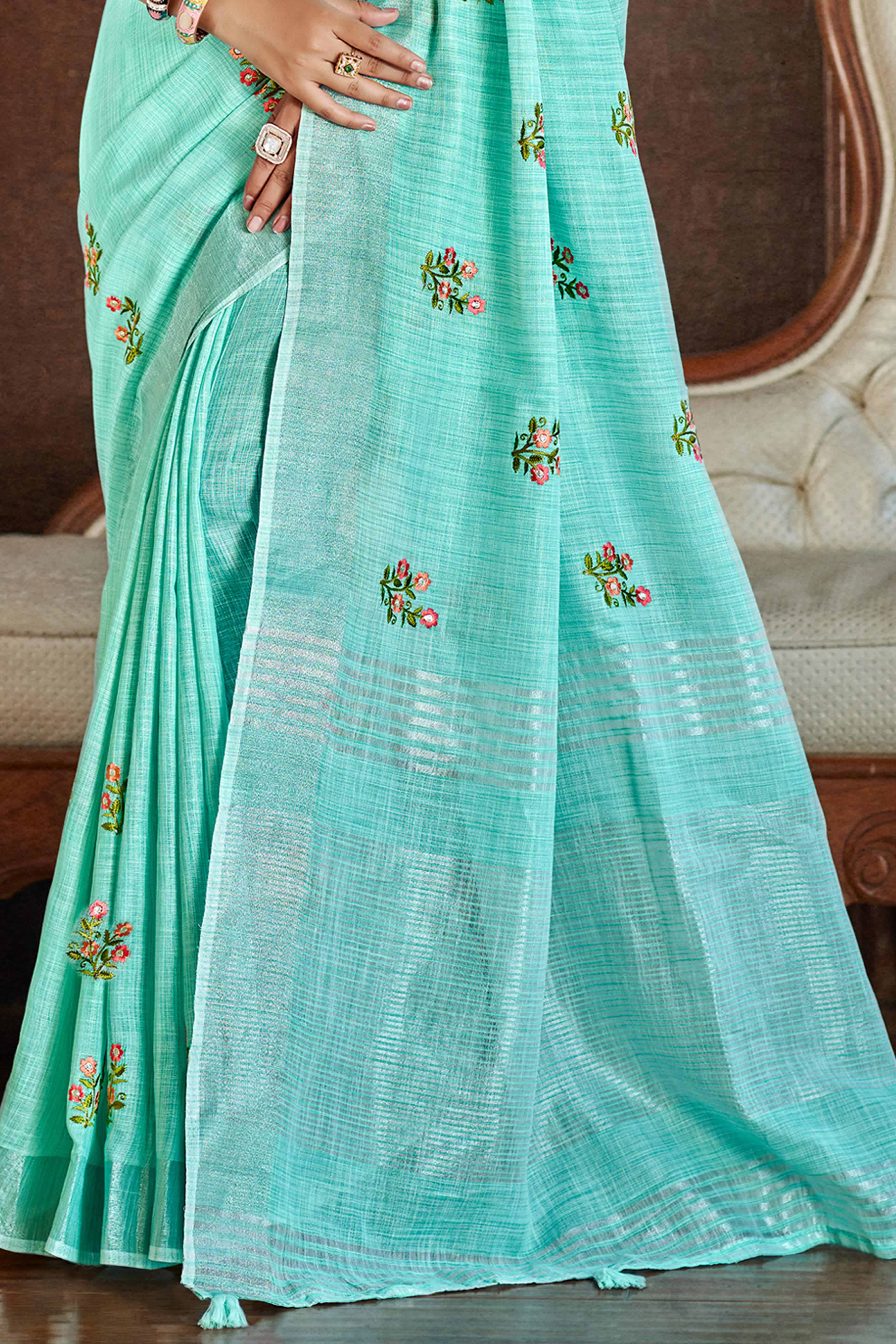 Turquoise Embroidered Linen Saree with Floral Motifs in Woven Fabric