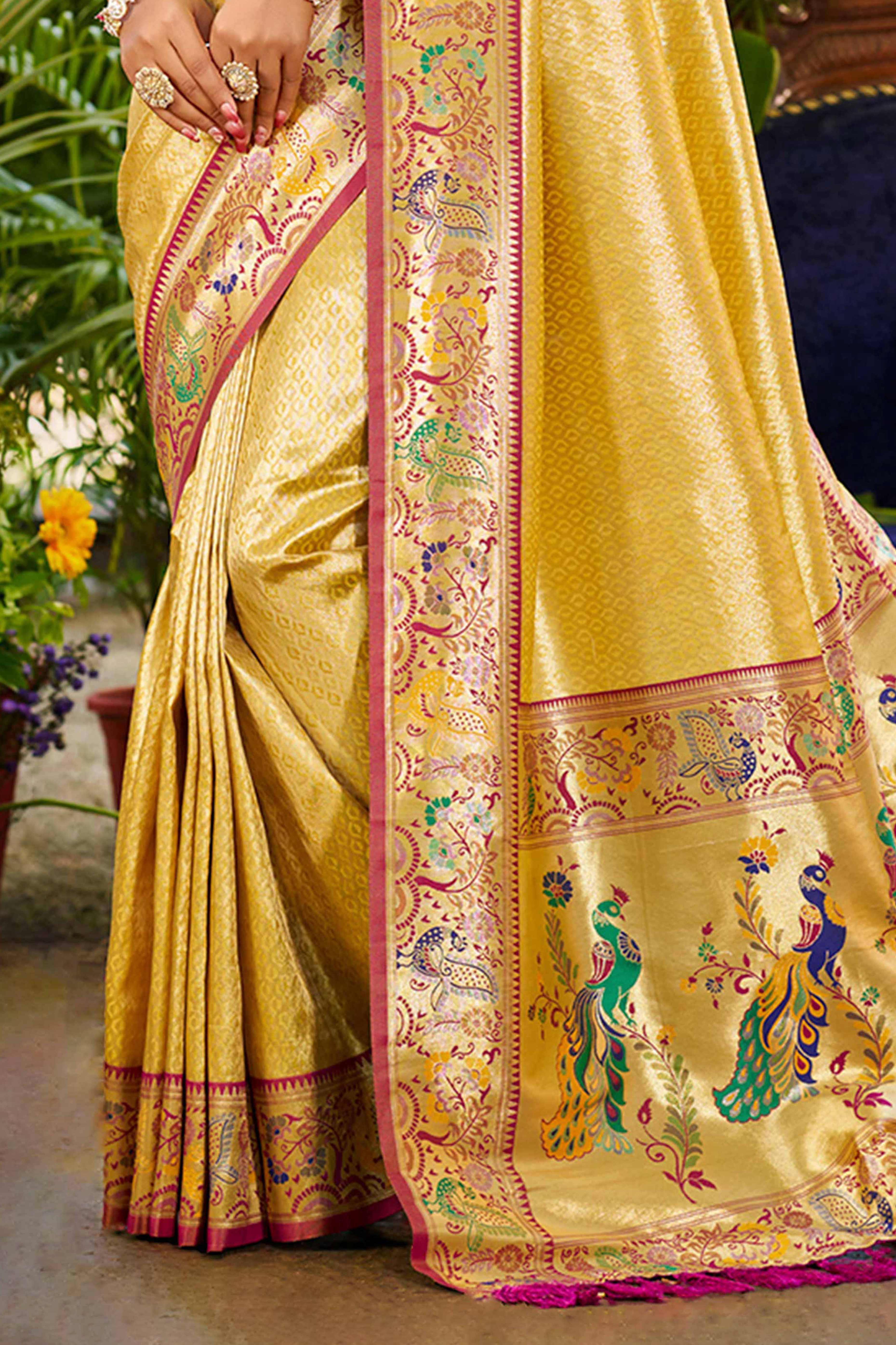 Graceful Yellow Silk Blend Saree Adorned With Intricate Zari Weave & Peacock Motif Pallu