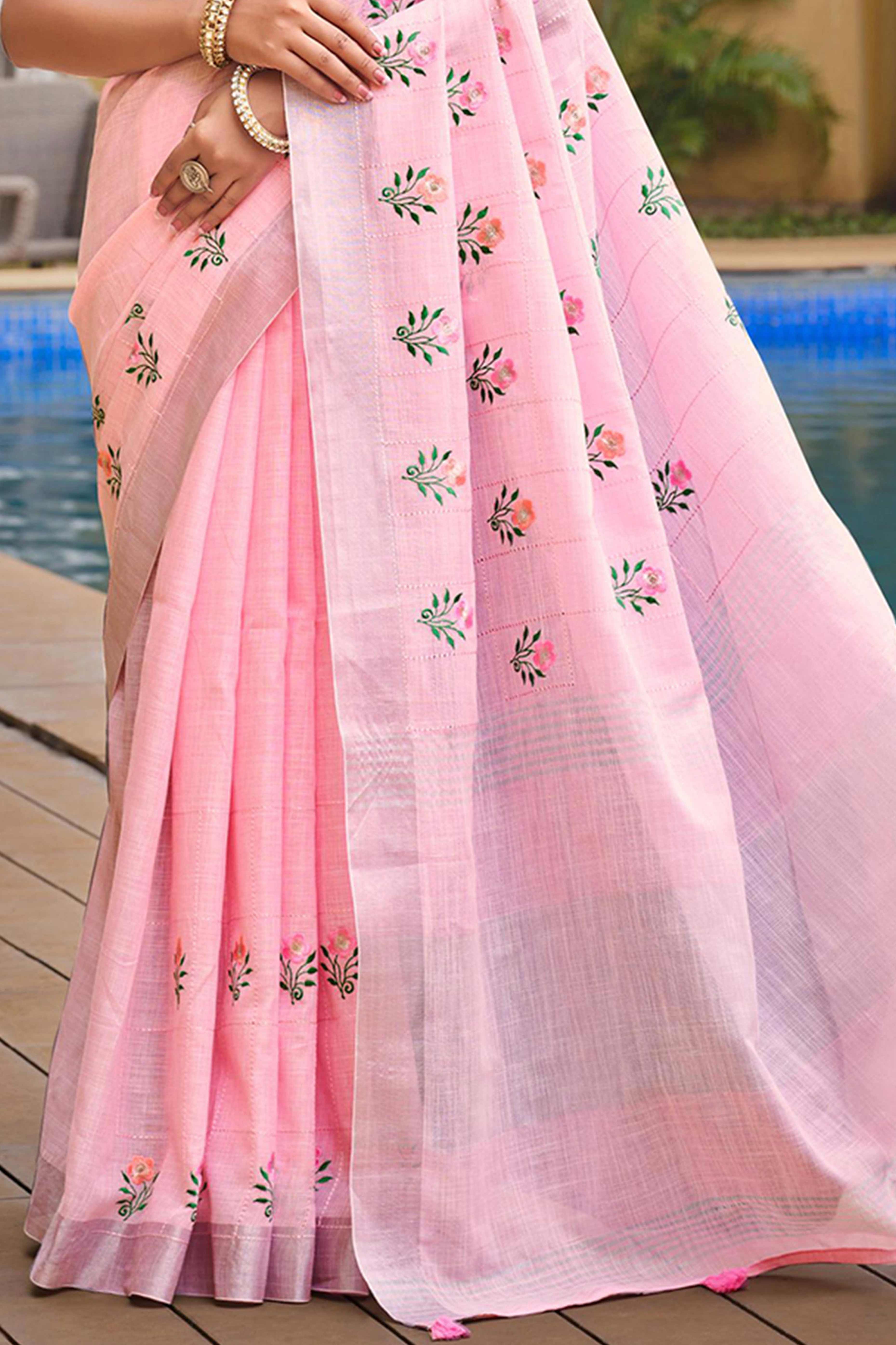 Captivating Pastel Pink Floral Thread Embroidered Linen Saree With Elegant Weaving Border