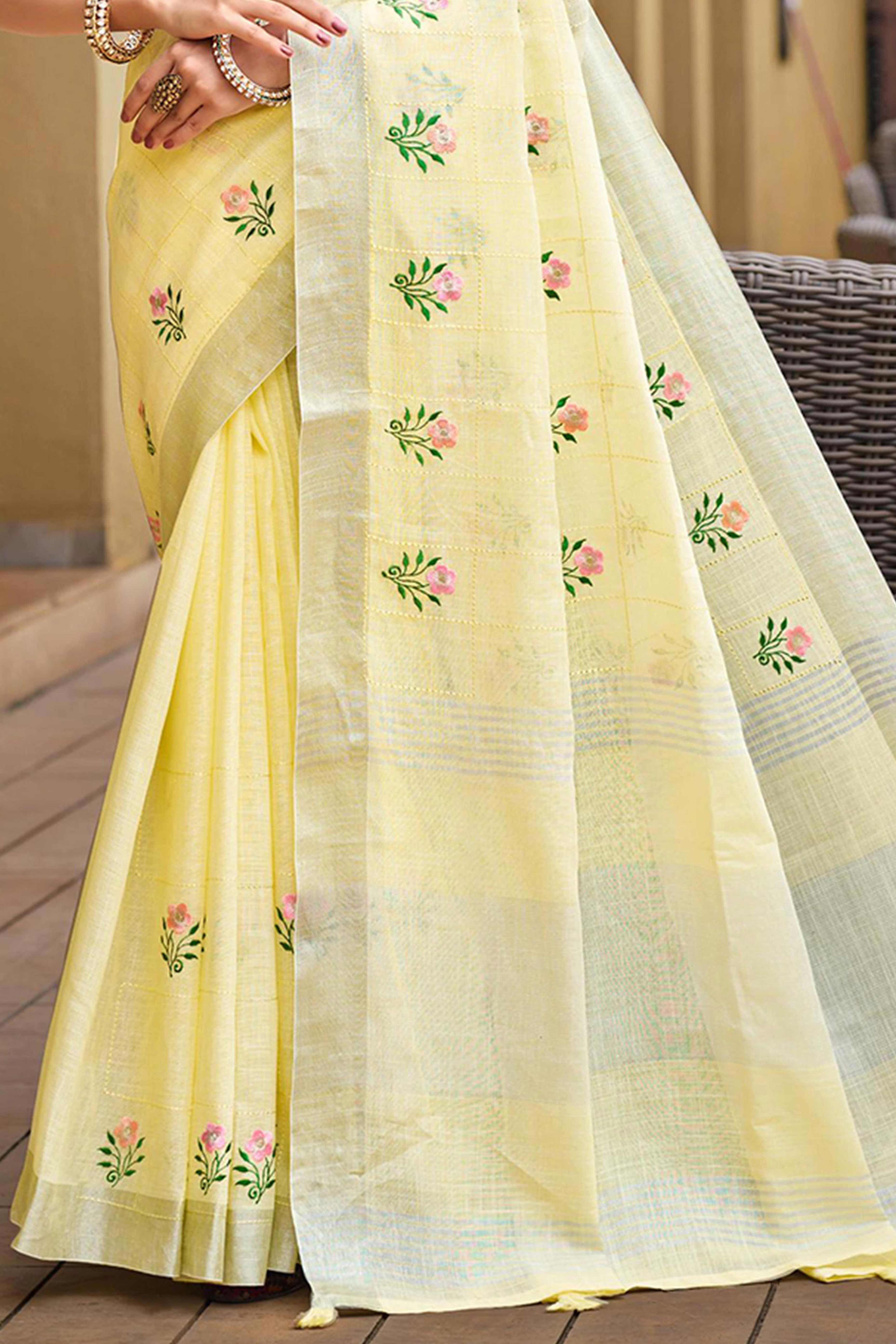 Captivating Yellow Floral Thread Embroidered Linen Saree With Elegant Weaving Border