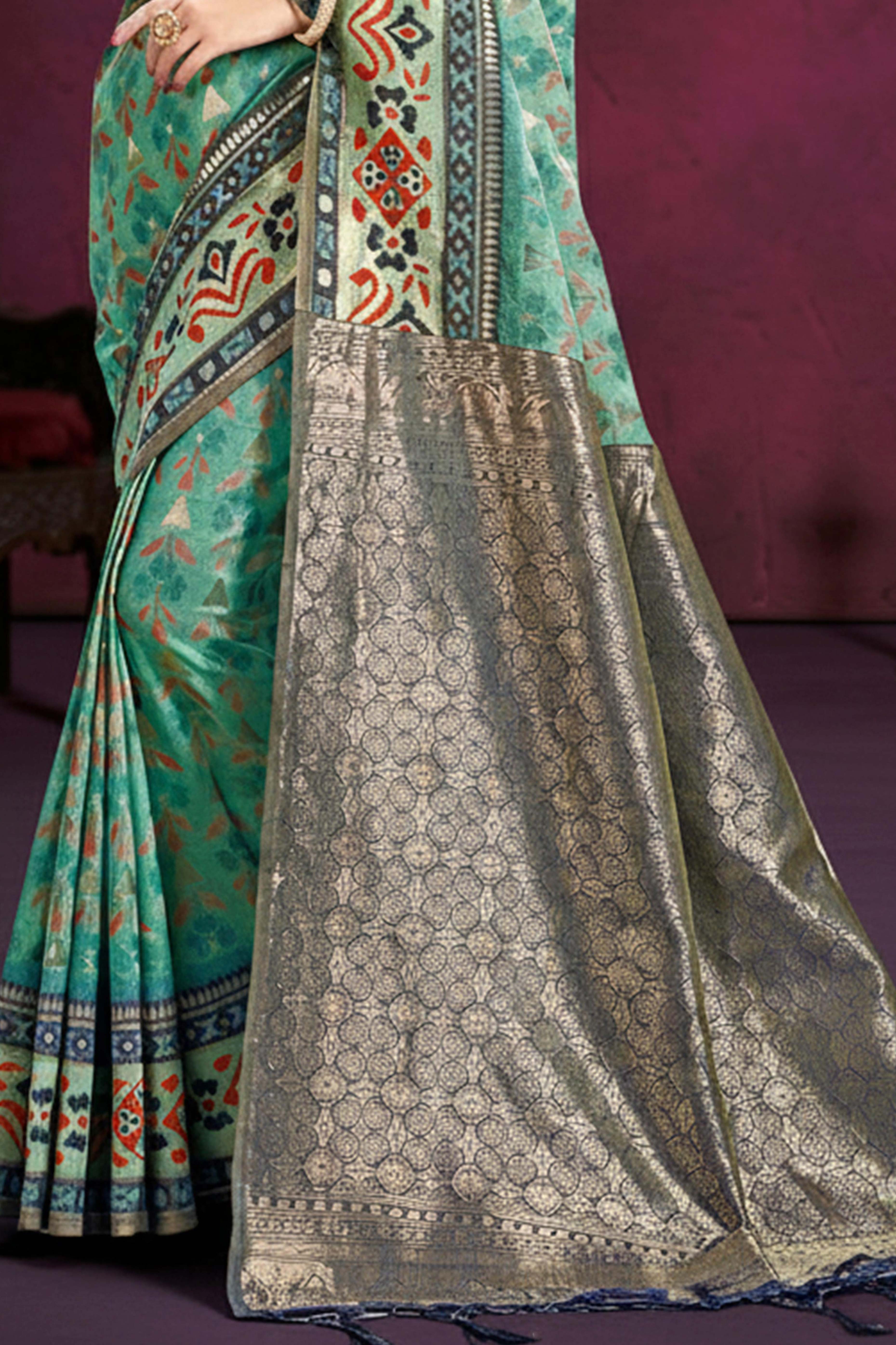 Designer Turquoise Cotton Silk Saree Showcasing Delicate Floral Weaving & Tassel Pallu