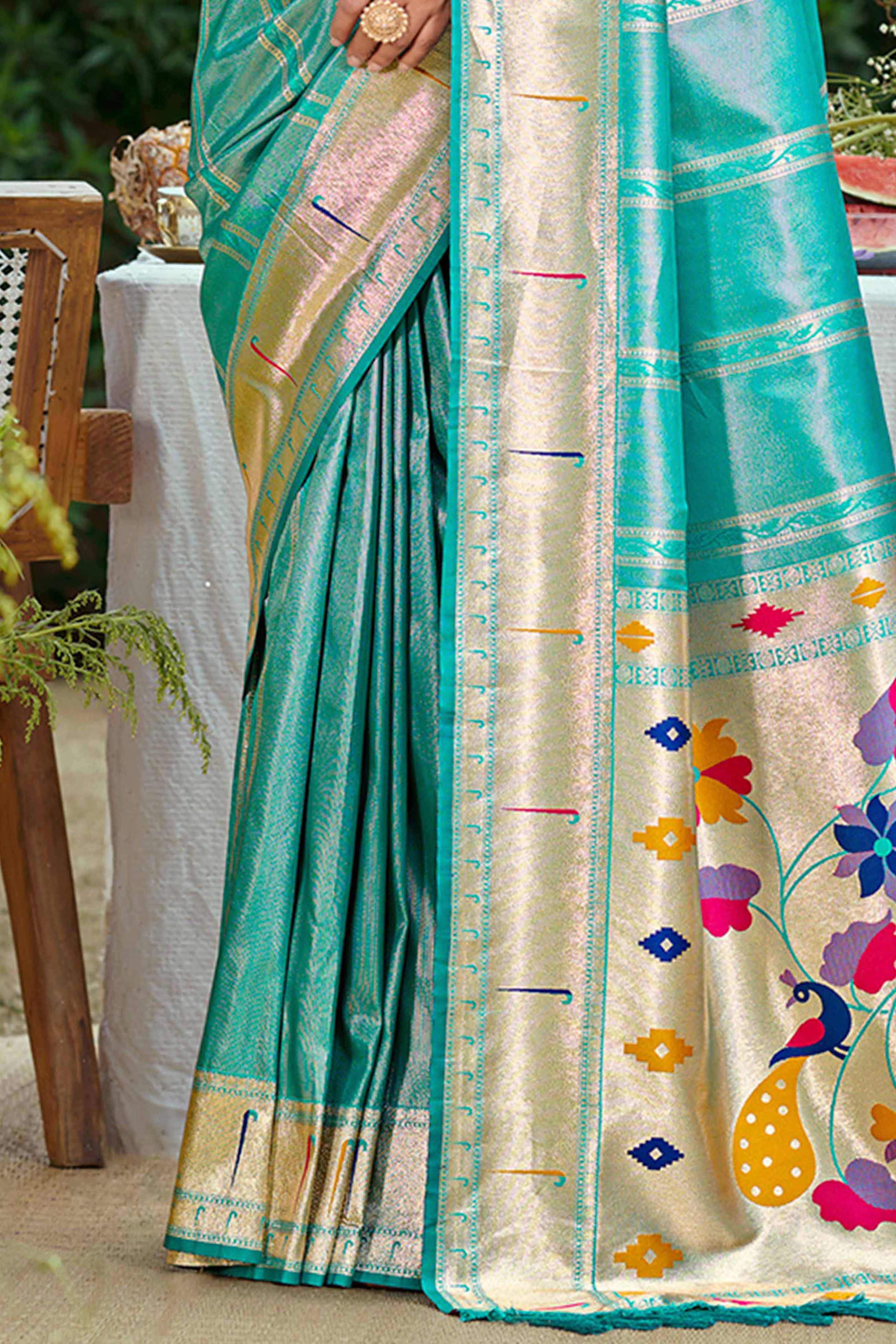 Turquoise Designer Weaving Silk Blend Saree Accented With Graceful Peacock & Floral Motif Pallu