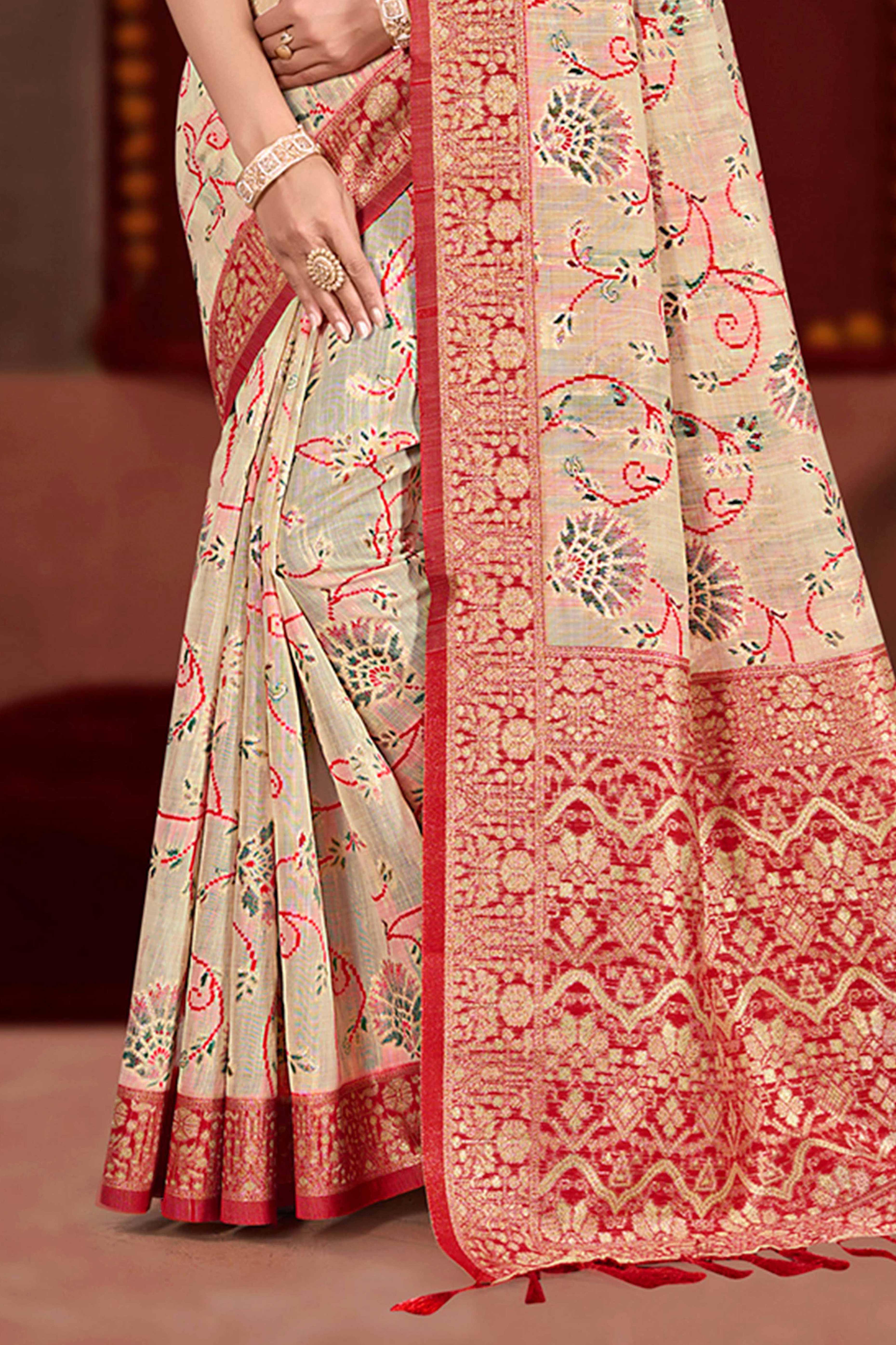 Elegant Beige Cotton Silk Saree Adorned With Floral Weaving & Graceful Tassel Pallu