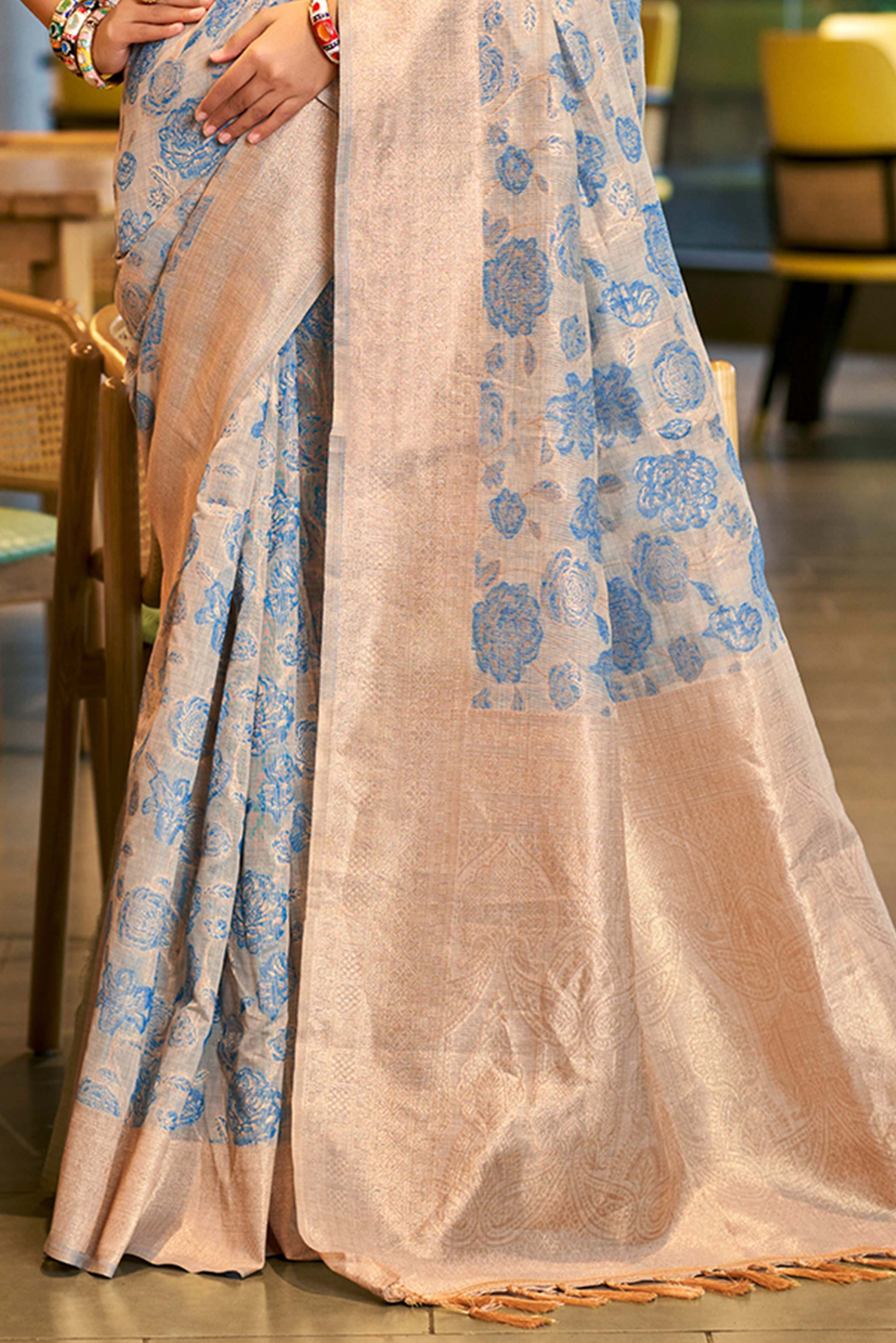 Blue Premium Cotton Silk Saree Highlighted With Floral Weaving Work & Tassel Pallu